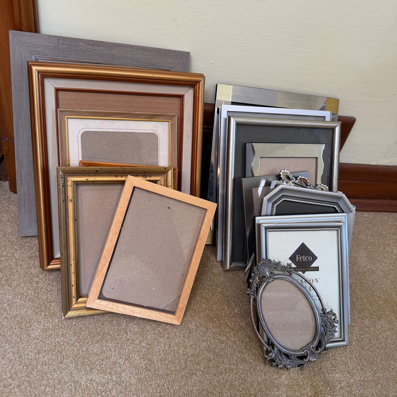 Group of photo, picture frames with silver, wood, and brass finishes, variety of sizes from 3x5 to 8x10