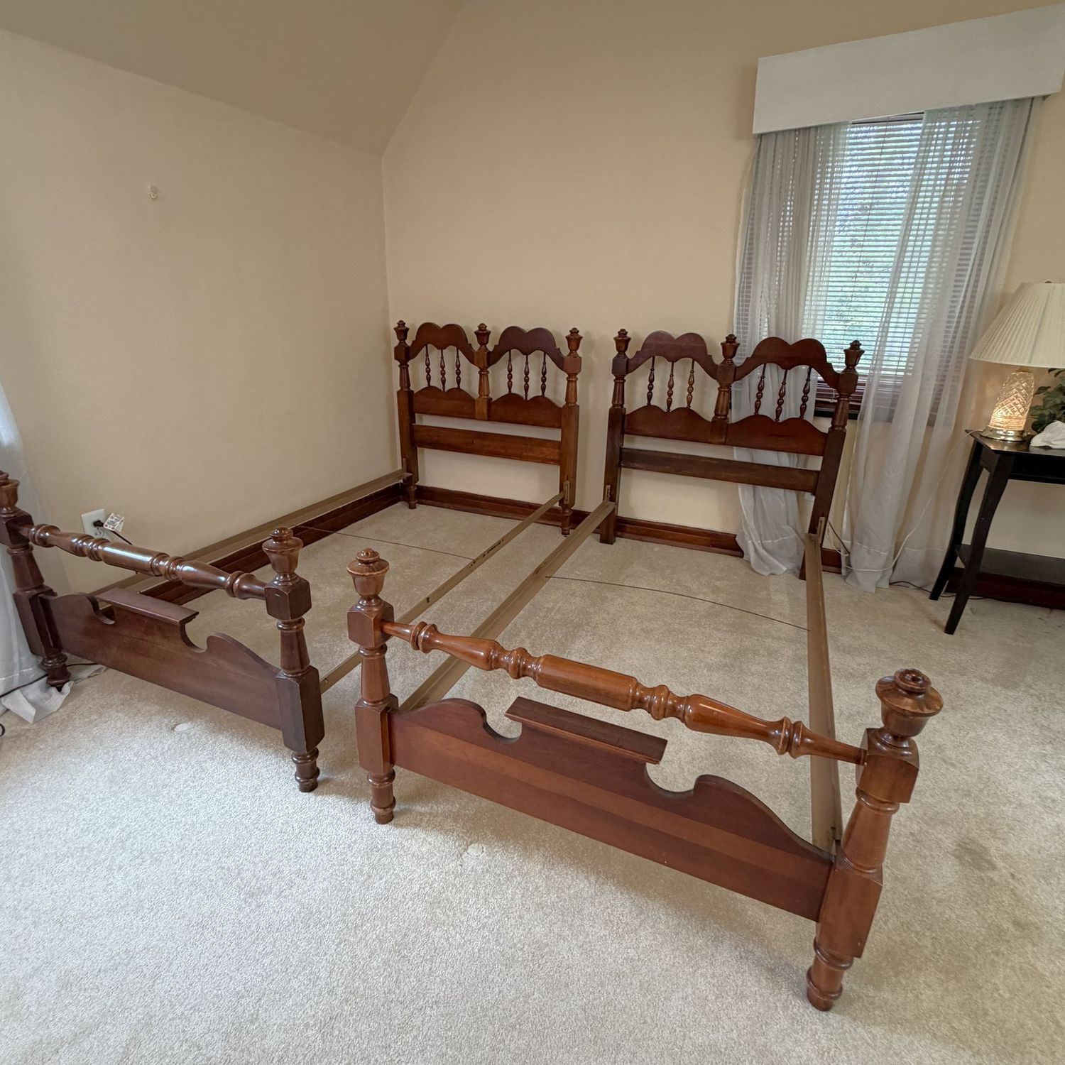 Pair of solid wood Twin-Size bed frames, very pretty, some wear (This item is heavy and upstairs - will need to be disassembled). Headboard is 40"H