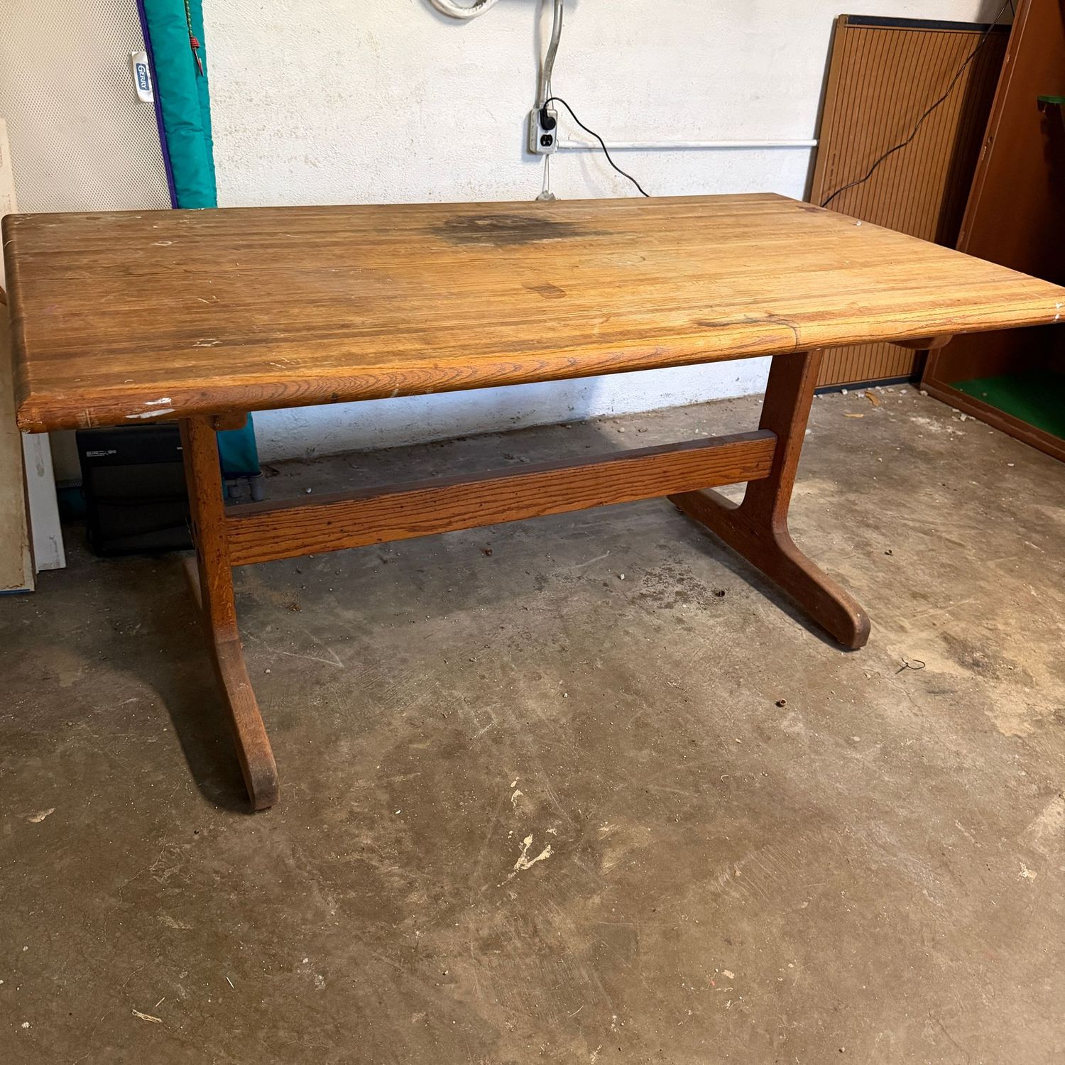 Large rectangular table with tressel legs solid wood top, very sturdy, some wear and spots, perfect for painting, sewing, or other crafts 65" x 36" (this item is heavy & in the lower level)