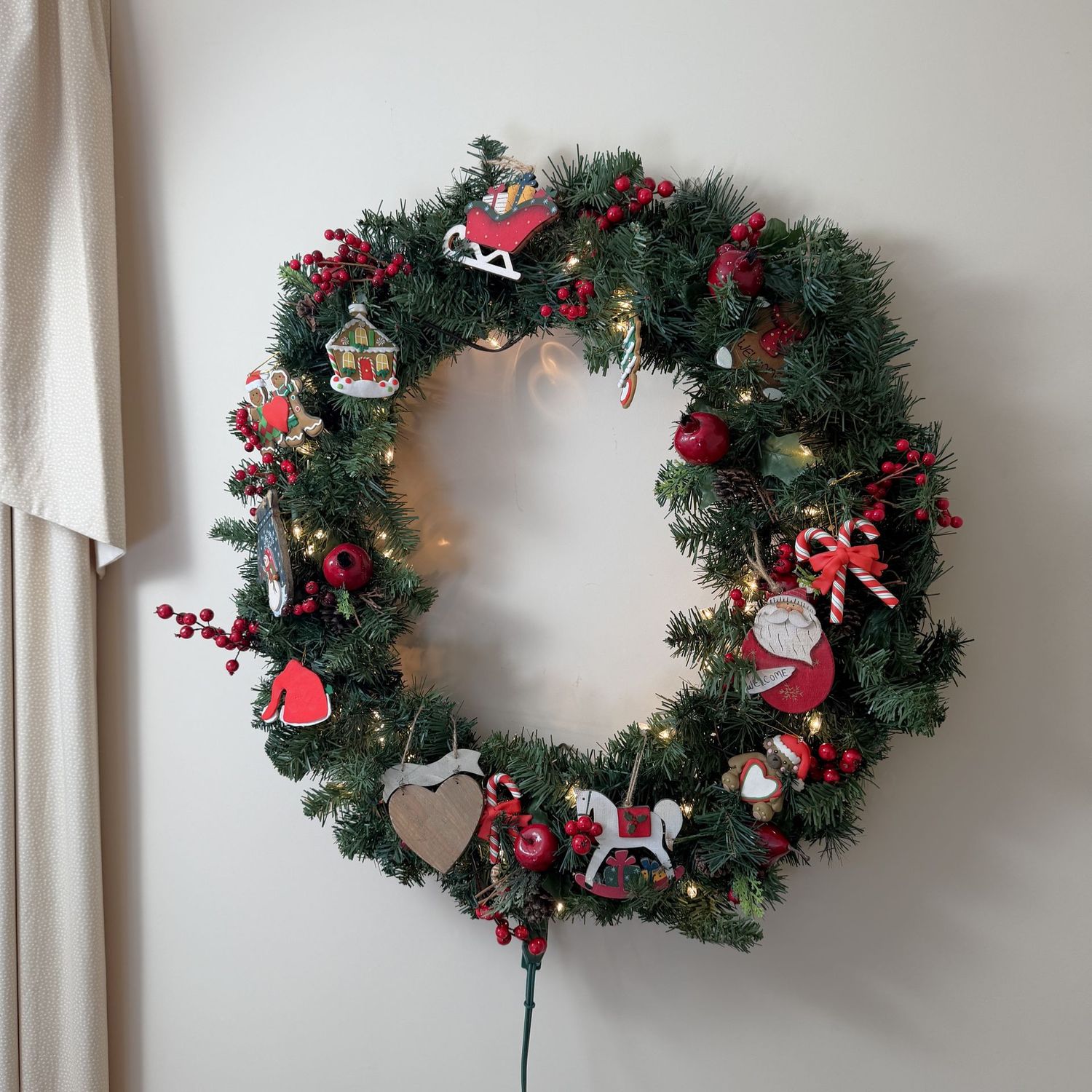 Large, lighted Christmas wreath with wooden ornaments, 33 Large, lighted Christmas wreath with wooden ornaments, 33"W