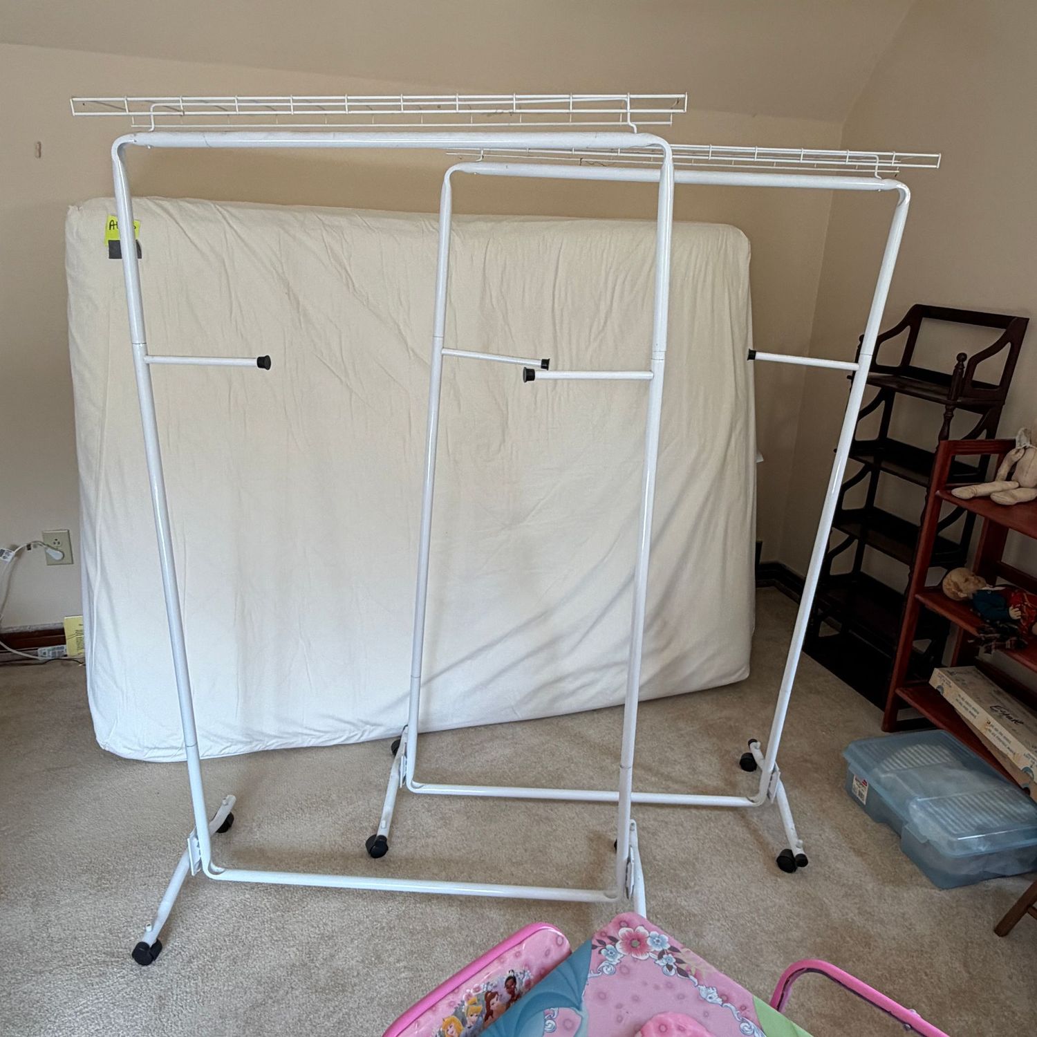 Rolling tubular metal clothing racks with a shoe/hat shelf, will disassemble easily, 40"L x 64"H