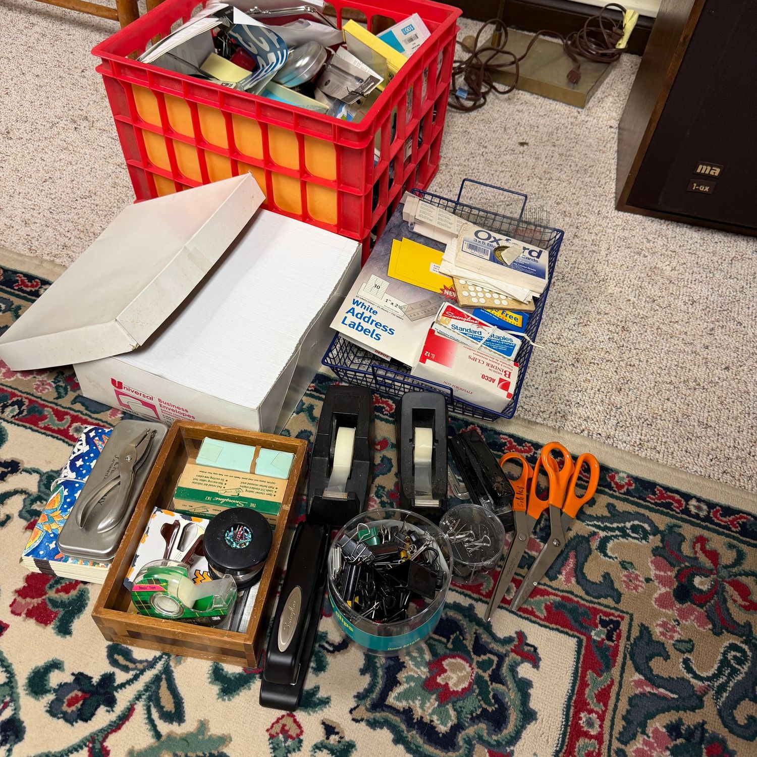 Group of office supplies, envelopes, hole punch, paperclips, scissors, tape rolls, stapler, note paper, index cards & more (This item is in the lower level)