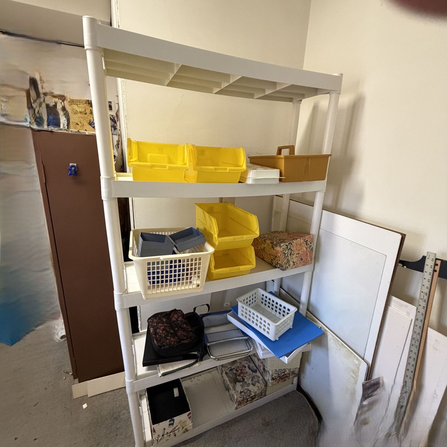 Light tan plastic shelf with plastic organizers, small stool, card boxes, good used condition, 5'7"H x 40"W x 12"D (buyer will need to disassemble & this item is in the lower level)