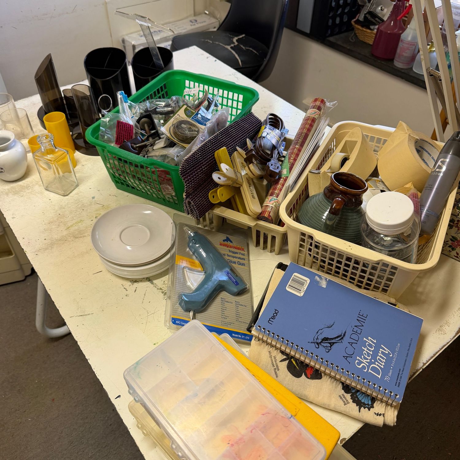 Artist, crafting, supplies with glue gun, plastic brush/pen  holders, picture hanging items, tape dispenser & more (This item is in the lower level)