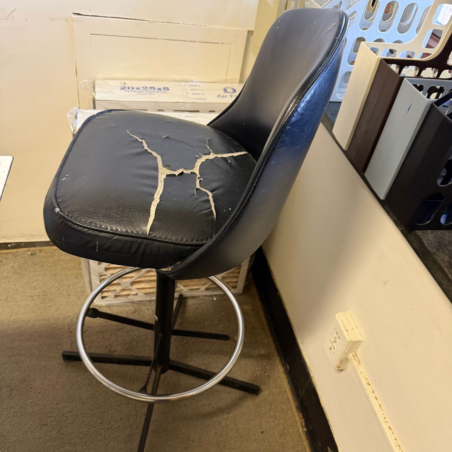 Vintage black vinyl swivel stool, seat needs repair, 34"H x 13"W (This item is in the lower level)
