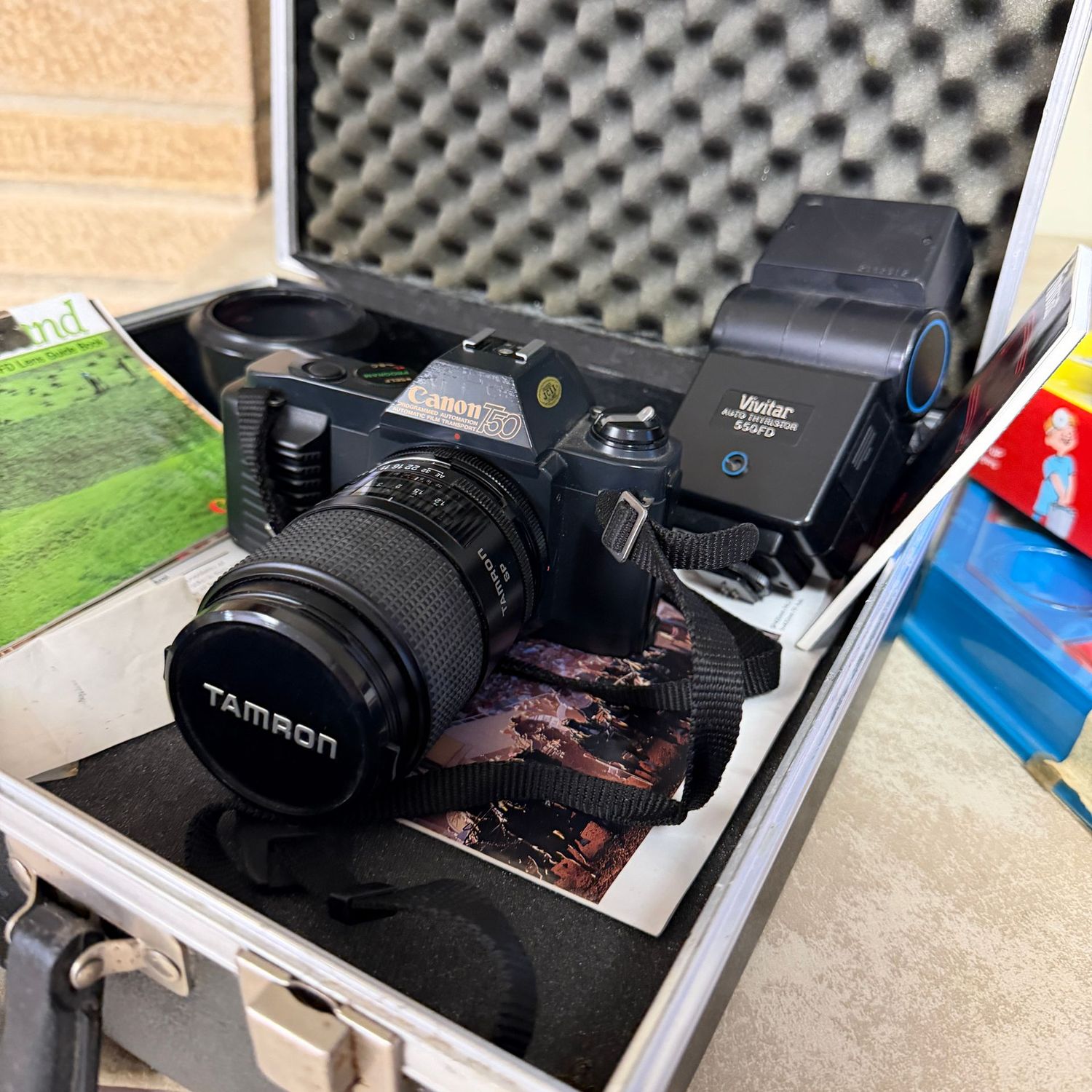 Canon T50 35mm camera, Vivitar 550FD flash, Tamron 90mm lens, in padded case Canon T50 35mm camera, Vivitar 550FD flash, Tamron 90mm lens, in padded case