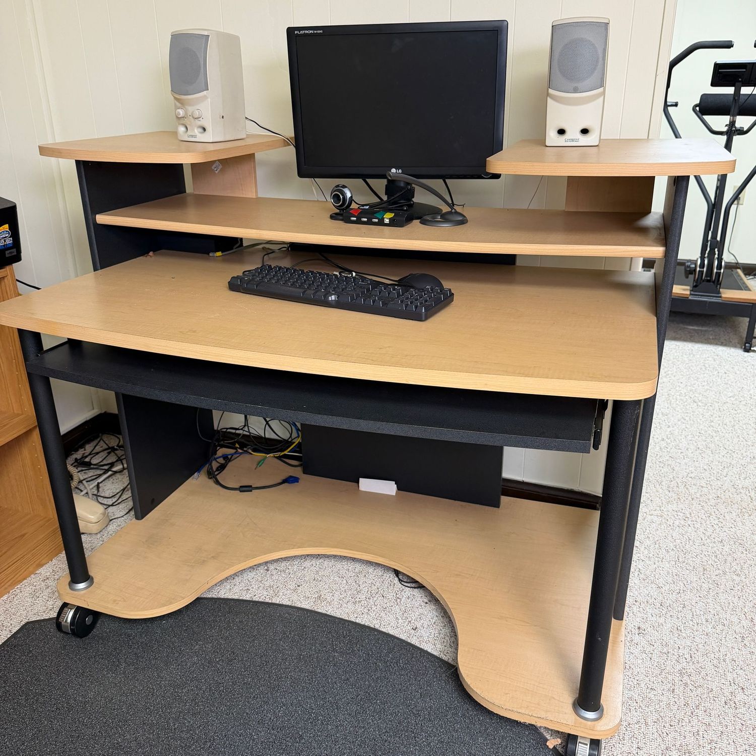 Large multi-level laminate desk on lockable casters, pull-out shelf (This item is heavy and in the lower level - also will need to be partially disassembled to move) 40 Large multi-level laminate desk on lockable casters, pull-out shelf (This item is heavy and in the lower level - also will need to be partially disassembled to move) 40"H x 46"W x 34"D