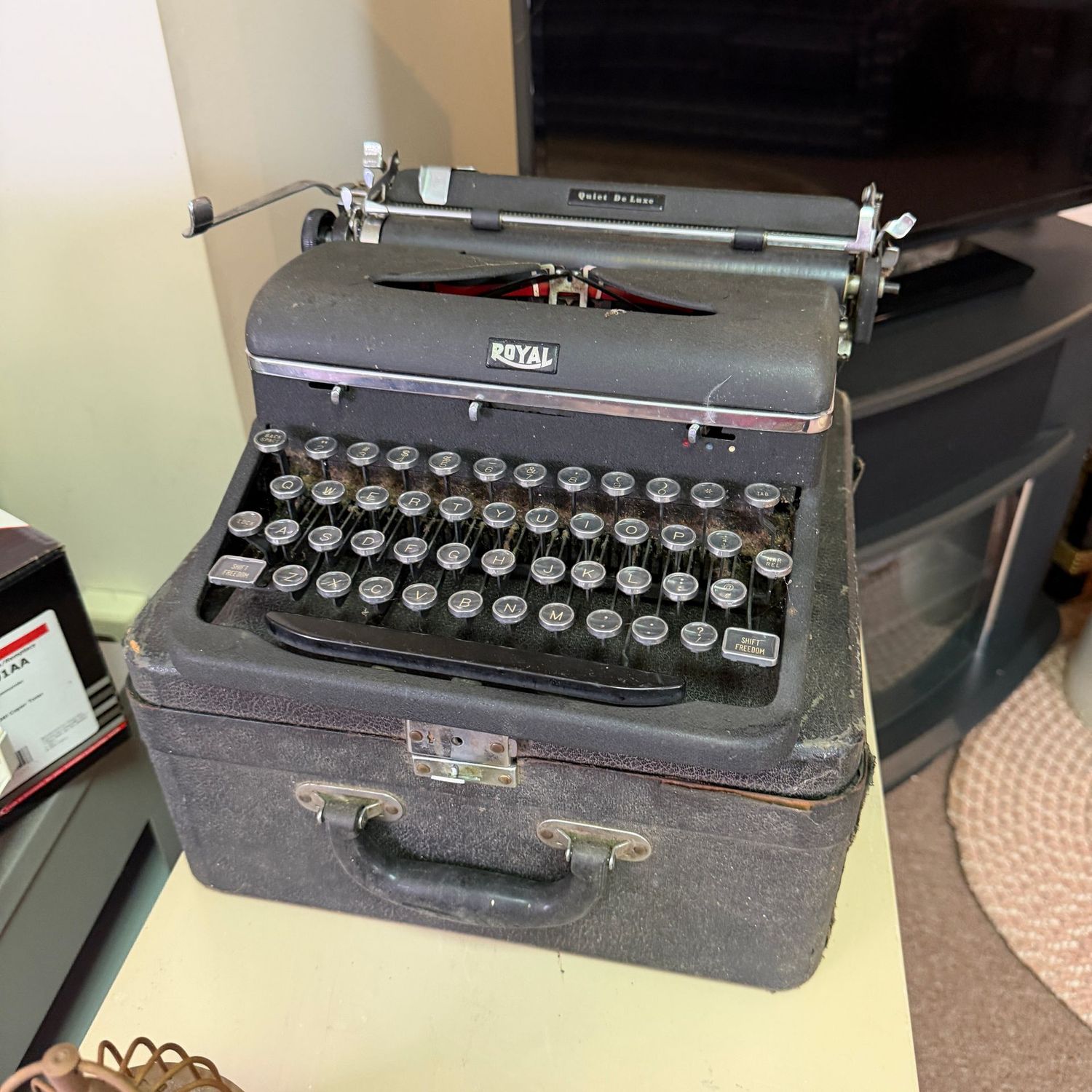 Royal Quiet DeLuxe portable manual typewriter (This item is heavy and in the lower level)