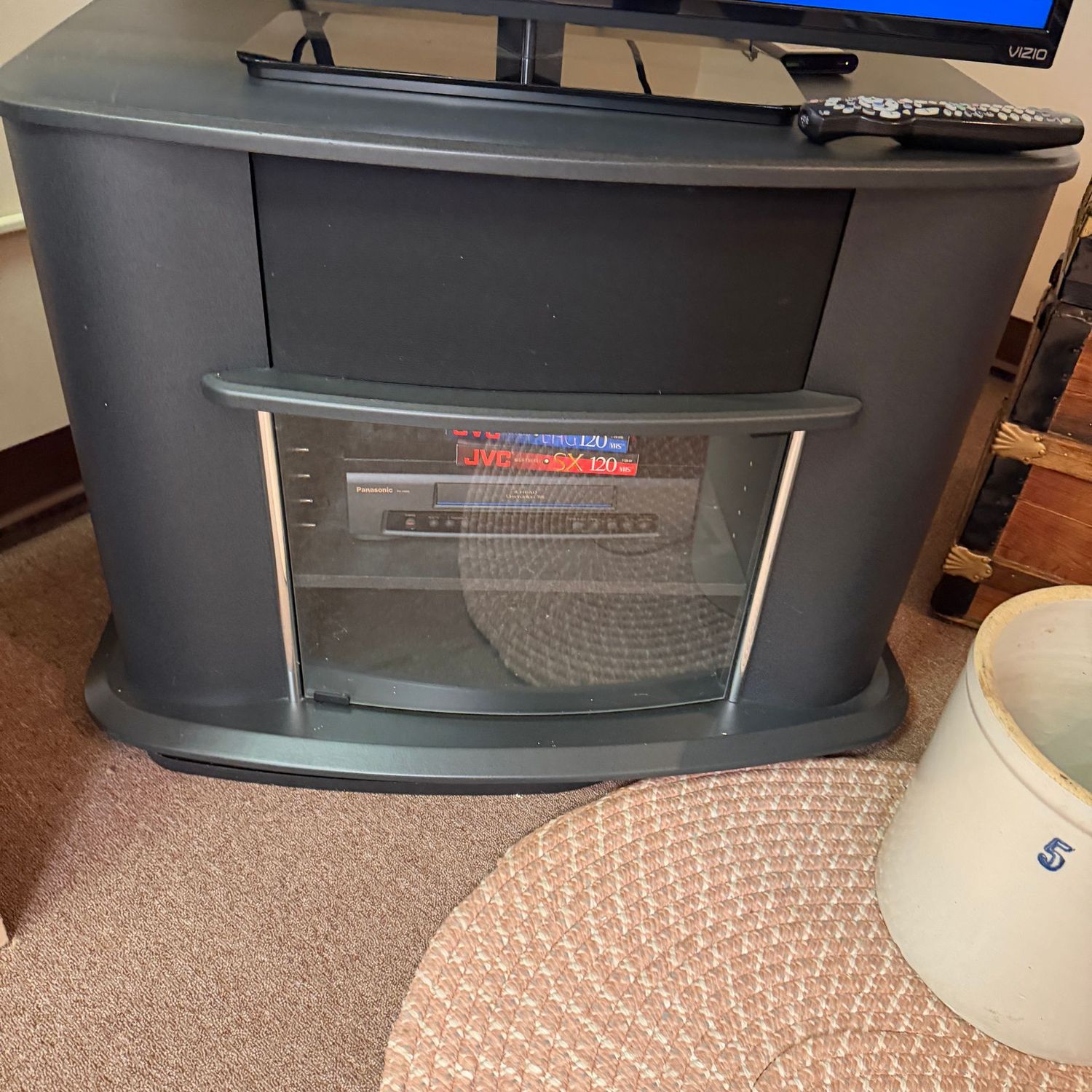 Dark grey laminate TV stand, 26"H x 36"W x 20"D (This item is heavy and in the lower level - OK to use a dolly)