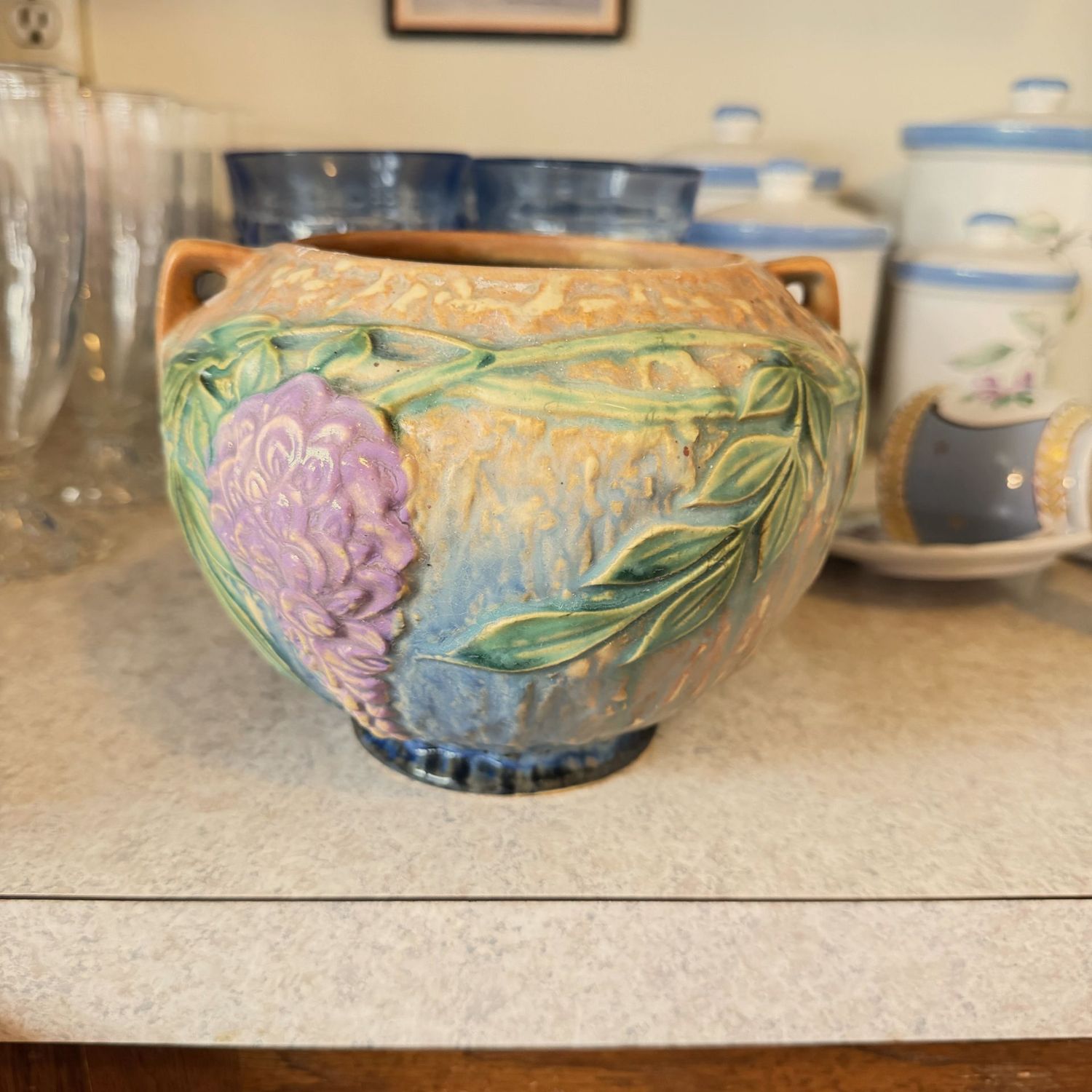 Roseville wisteria vase, ca. 1930 has minor chips inside the rim, has some crazing inside, has some hairlines on bottom, 5"H