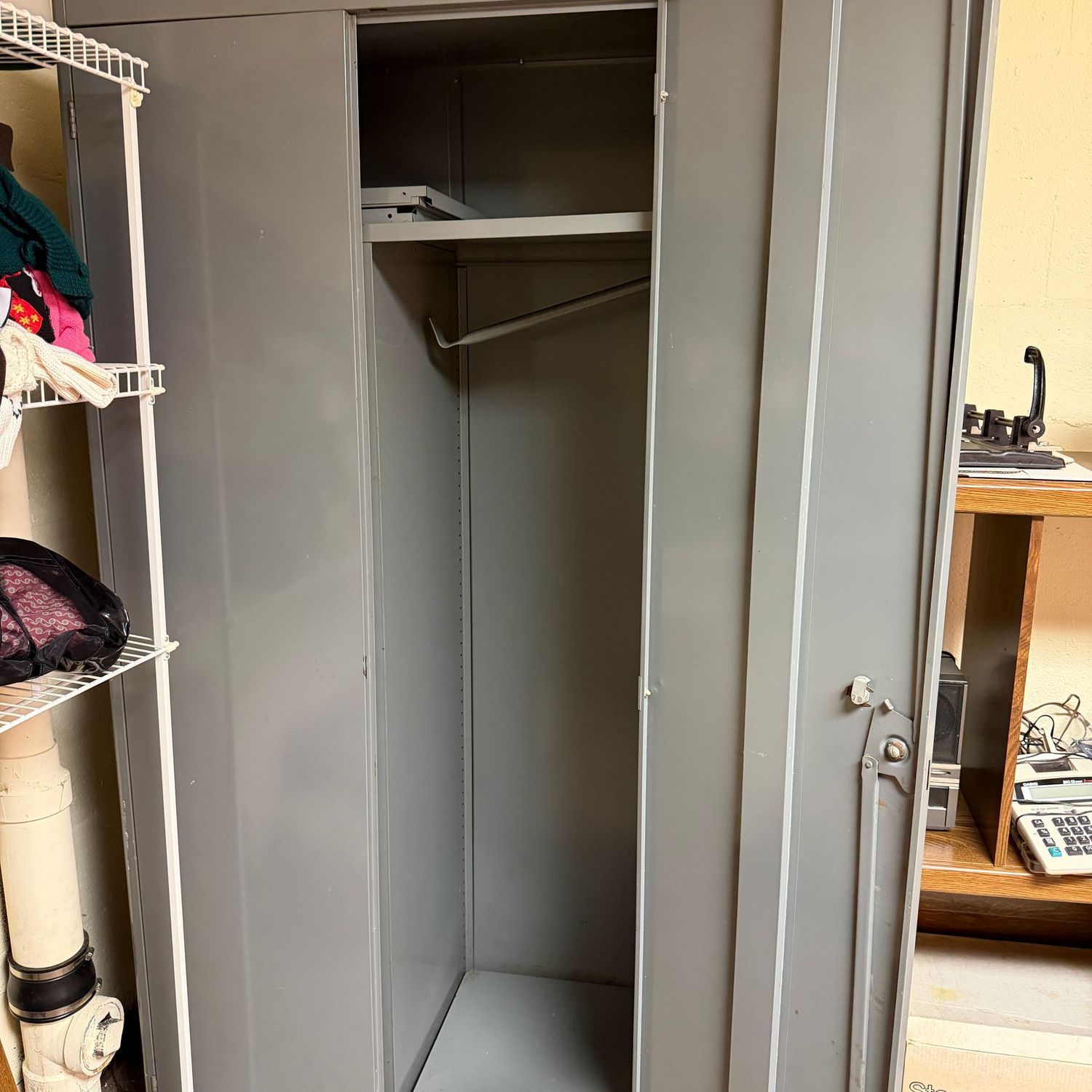 Very large Lyon grey steel 2-door cabinet with shelves, top has a bend on the left side, some scratches & oxidation, 6'5"H x 36"W x 20"D (This item is heavy and in the lower level - OK to use a dolly)