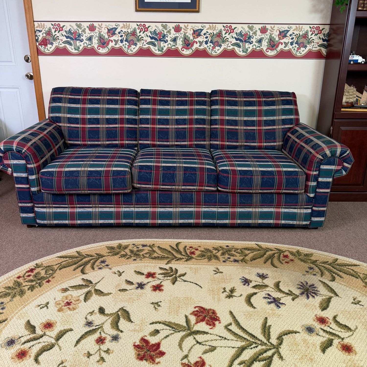 Large Simmons blue, green, and red plaid deep sofa, comfortable, 34"H x 34"D x approx. 8ftL This item is heavy & in the lower level)