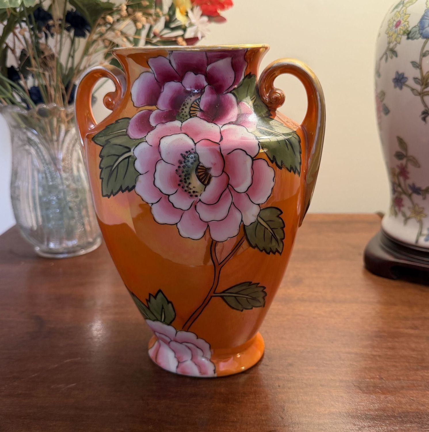 Orange luster peony double-handled vase, minor spots to parts of the finish, 8.5"H