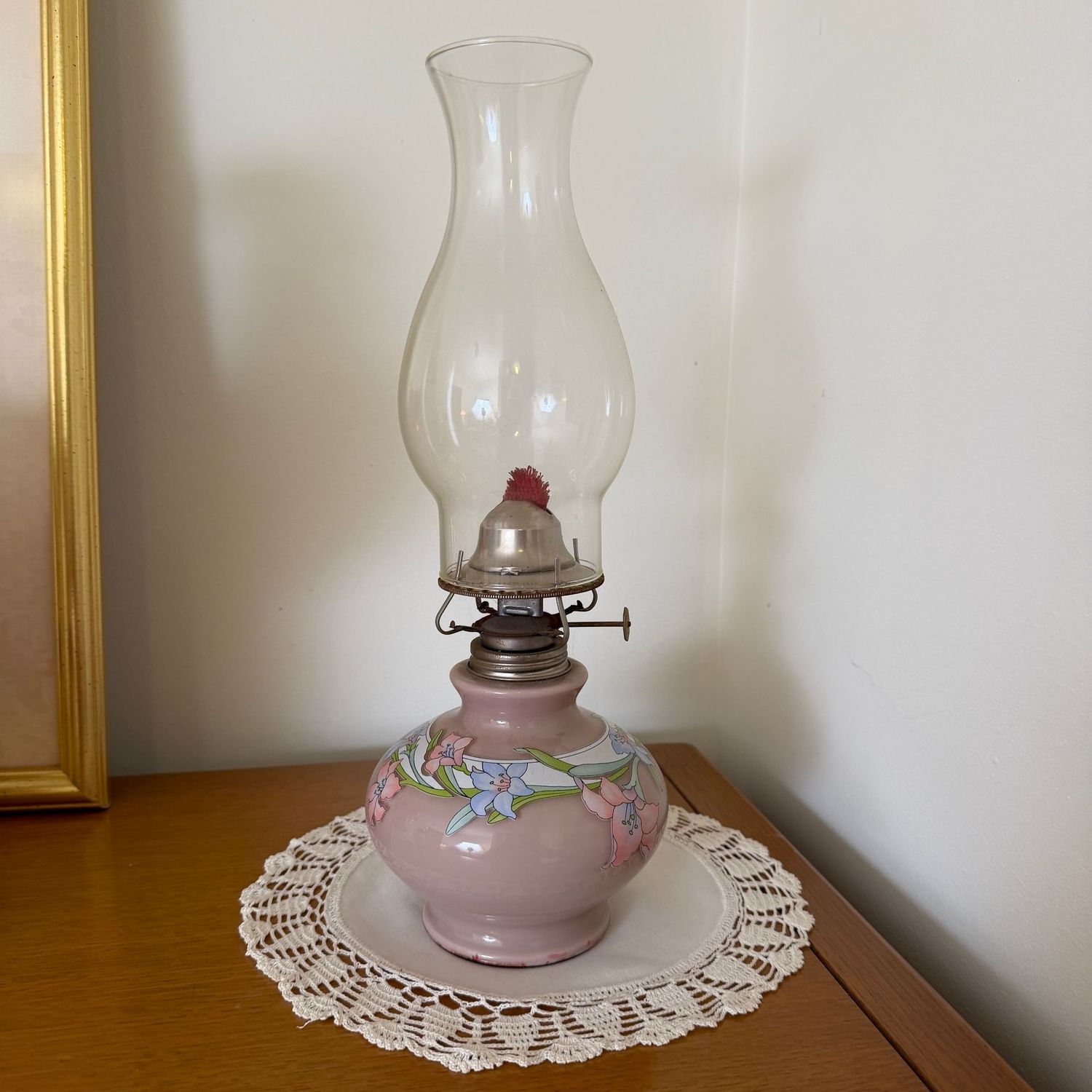 Vintage Kaadan oil lamp with soft pink base, blue and pink floral design, 15"H