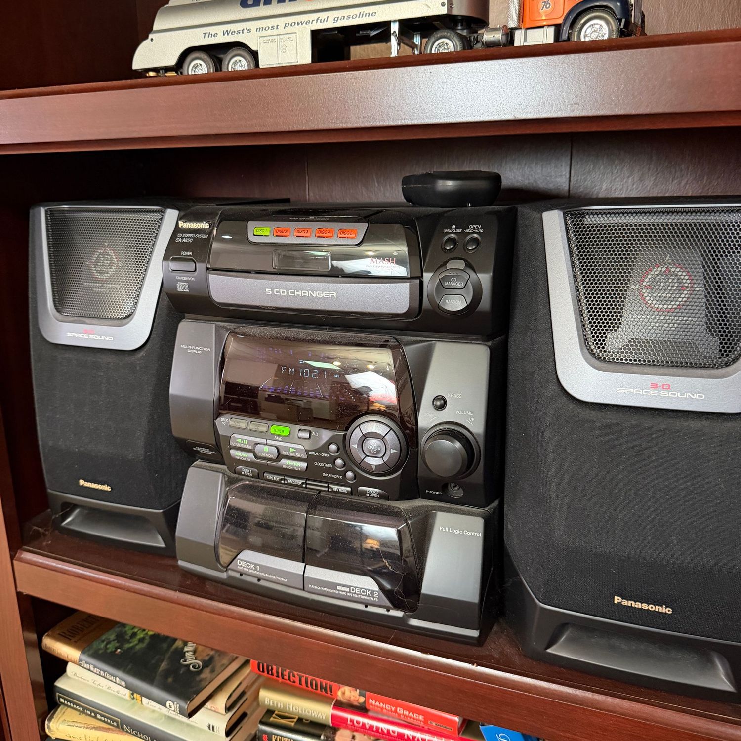 Panasonic stereo with detached speakers, CD does not open, tape deck not tested, radio works very well as do speakers, 24"W as seen