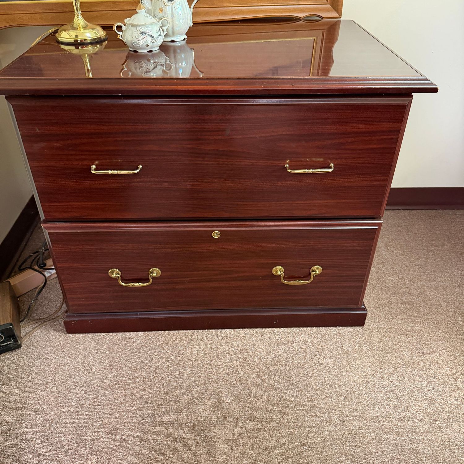 Large laminate file cabinet, a few scratches, 30"H x 35"L x 25"D (This item is heavy and in the lower level - OK to use a dolly)