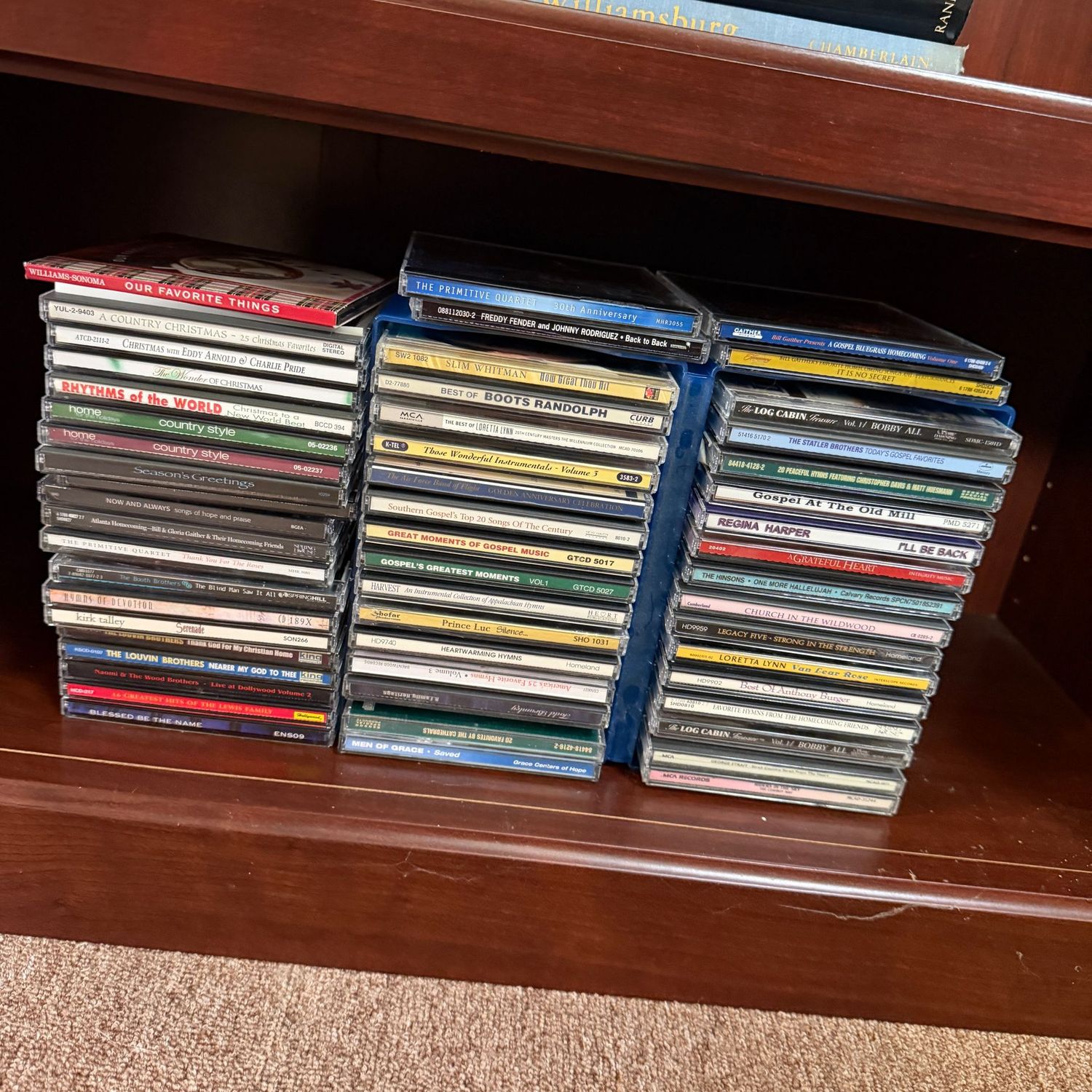 Shelf of CDs, mostly country, Christmas, and gospel