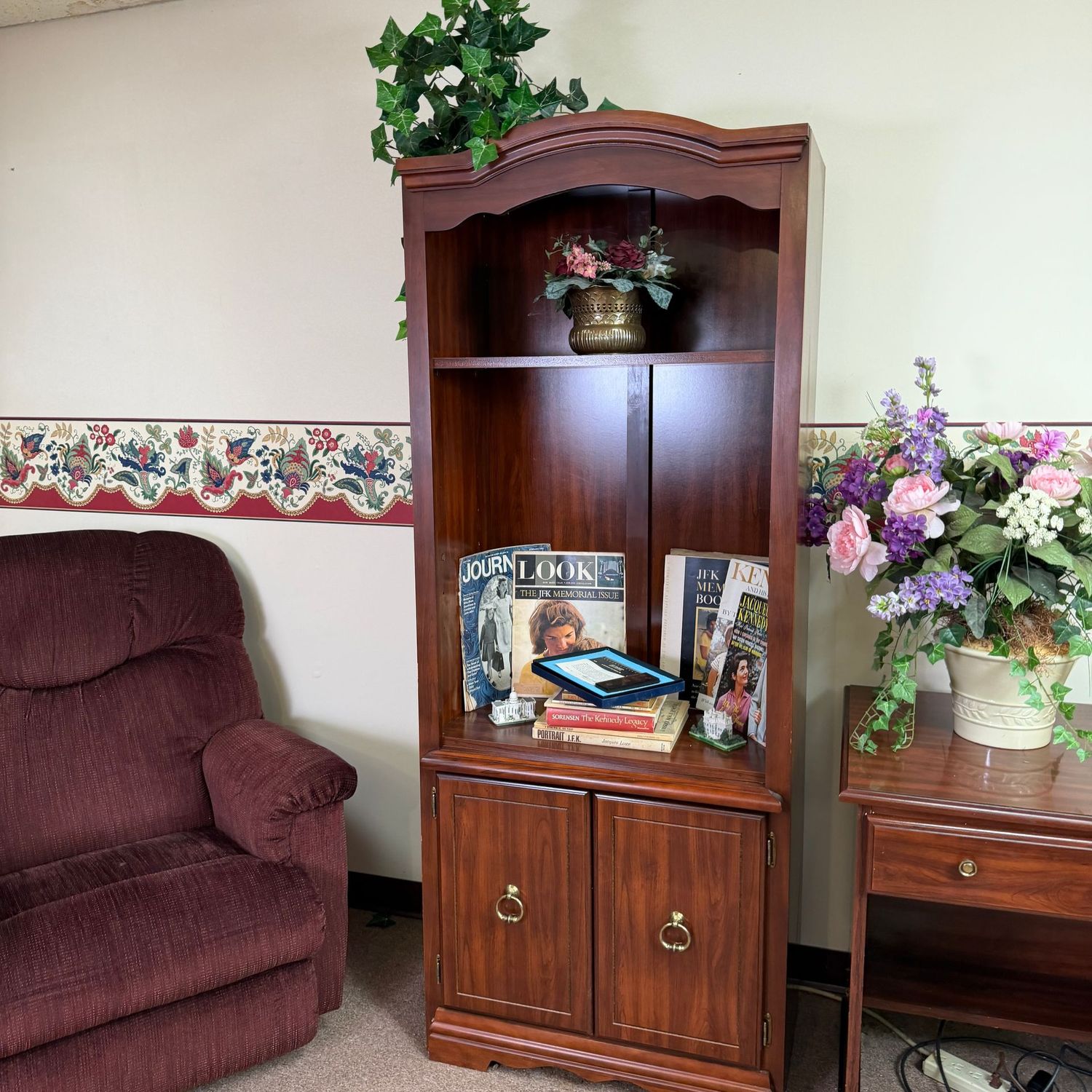 Tall laminate bookcase with lower storage, some wear, back needs tacked into place, 6'2 Tall laminate bookcase with lower storage, some wear, back needs tacked into place, 6'2"H x 17"D x 30"W (This item is heavy and in the lower level - OK to use a dolly)