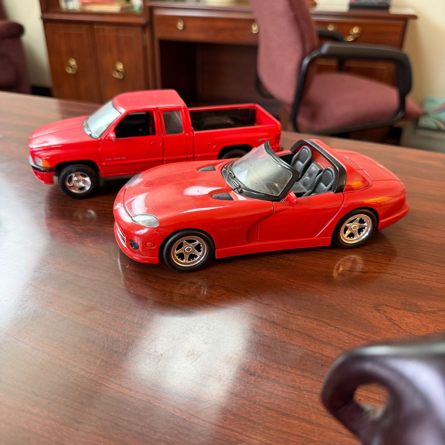 Red die-cast truck, 7", and plastic car