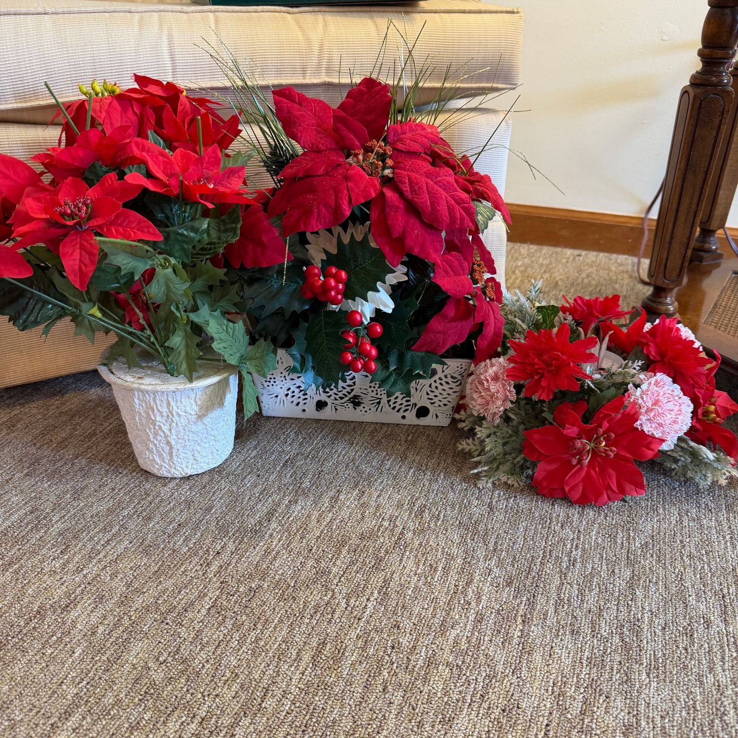 Two poinsettia arrangements (14 Two poinsettia arrangements (14"H), pink carnation metal candle holder