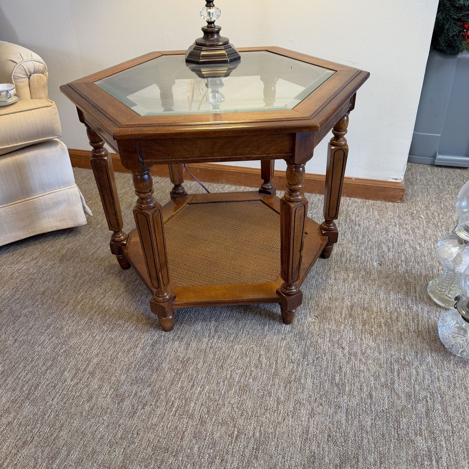 Vintage hexagonal side table, cane shelf, beveled glass top, nice condition, 20"H x 26"W (This item is heavy and in the lower level)