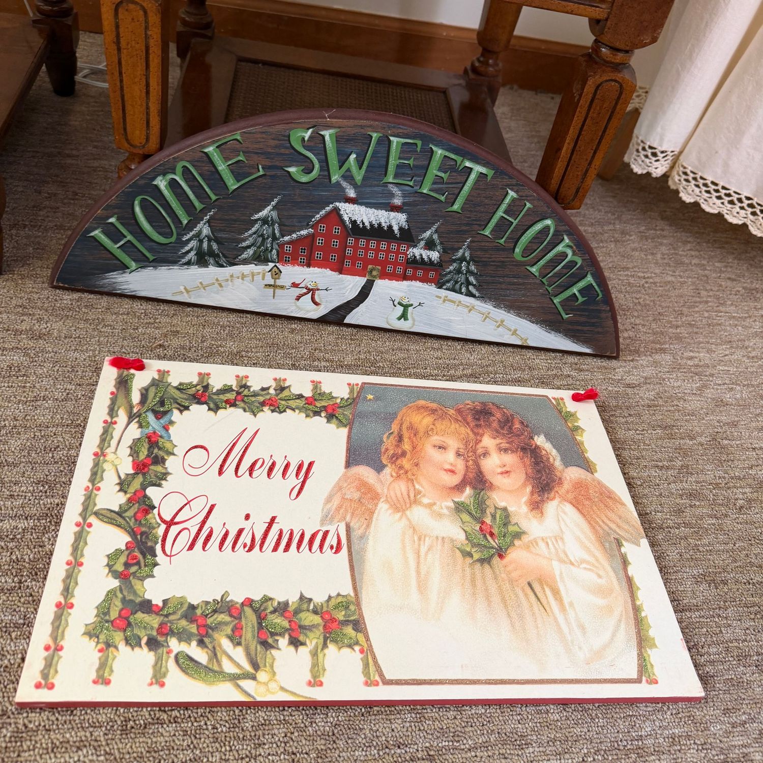 Two Christmas plaque signs, the largest is 11x18