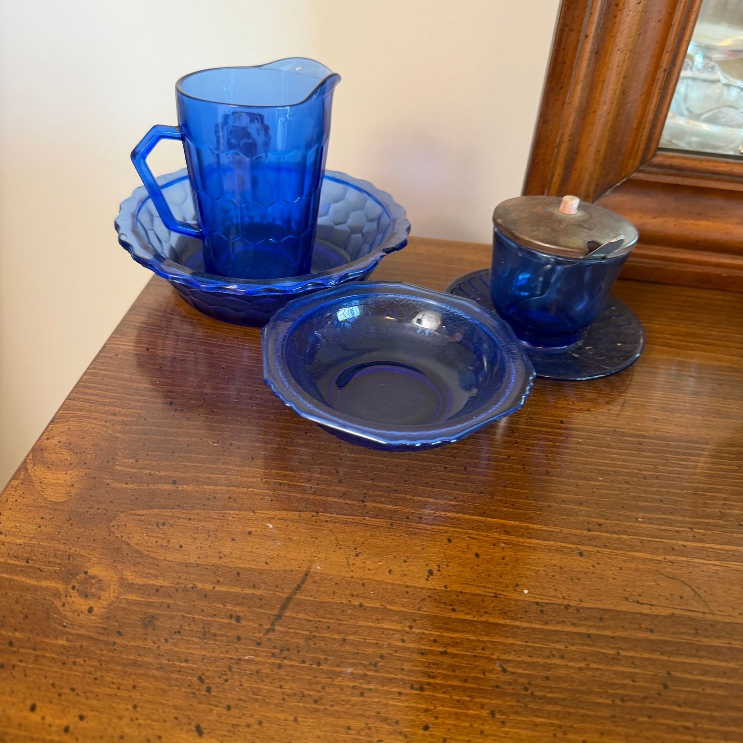 Vintage royal blue glassware, Shirley Temple creamer (bowl it is in has a chip) Vintage royal blue glassware, Shirley Temple creamer (bowl it is in has a chip)