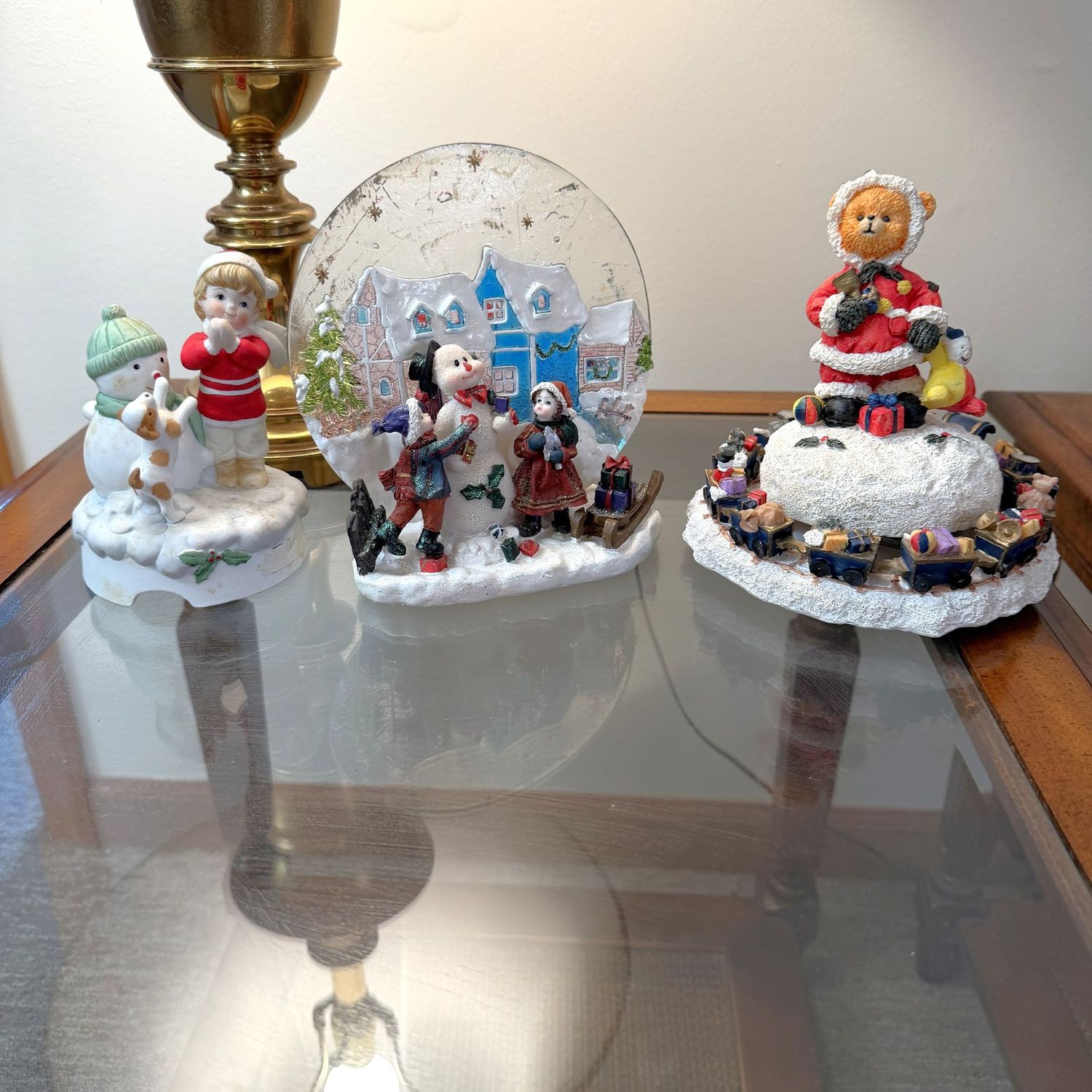 Three snowmen and winter figurines