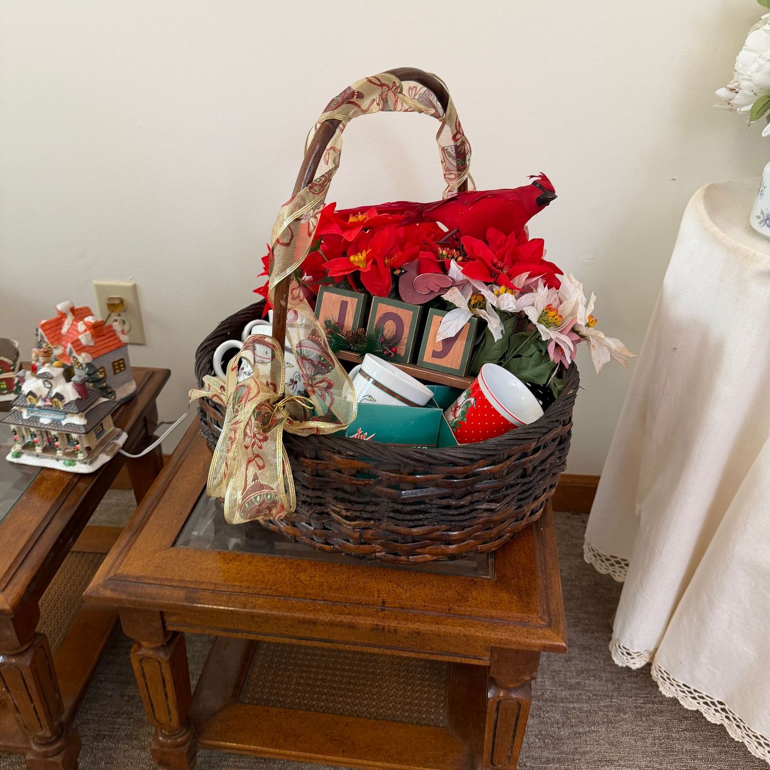 Basket (19"W) with Christmas flowers, mugs, and Joy sign