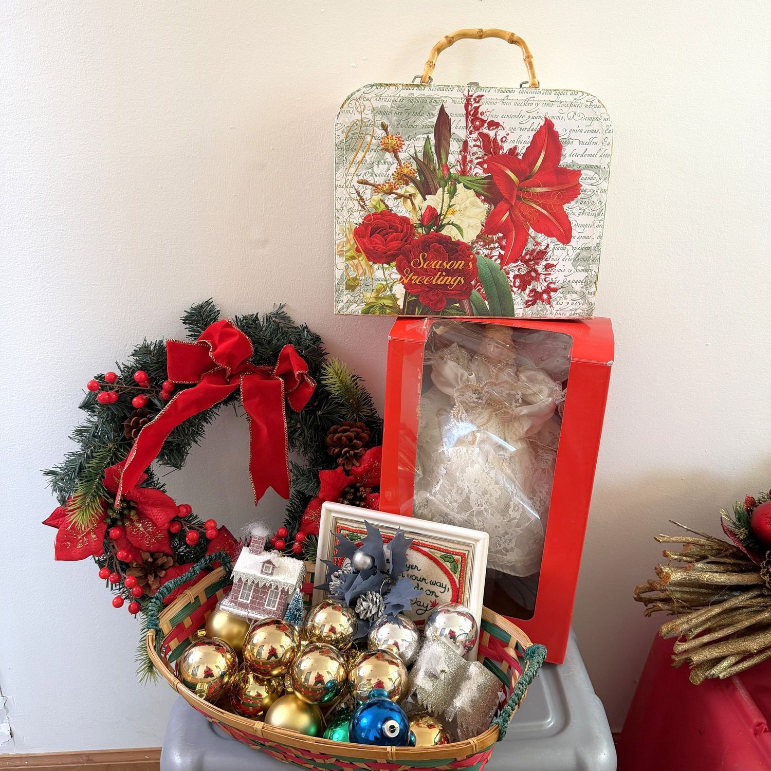 Christmas decorations including wreath, angel, small storage purse/box, ornaments, and 17"W basket