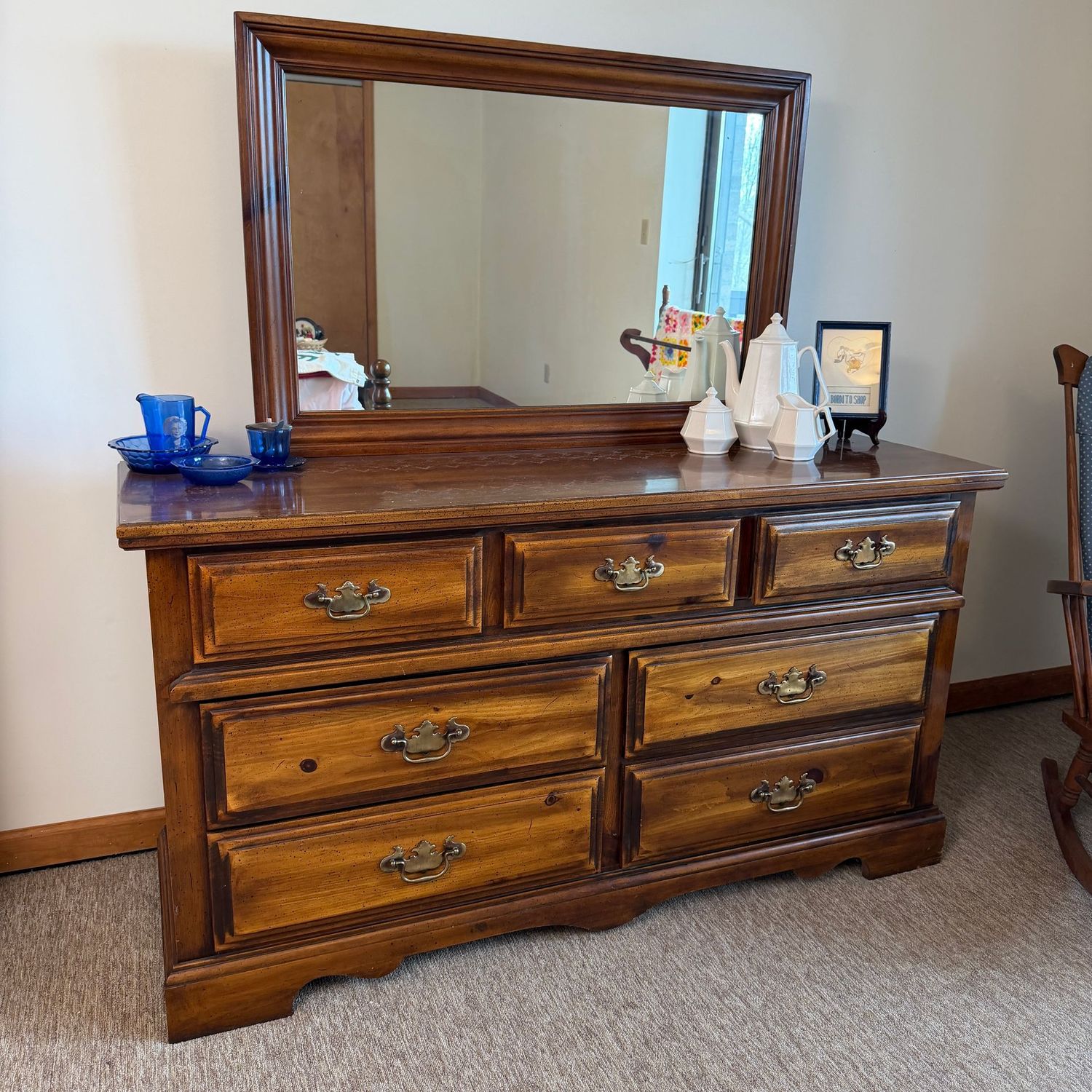 Vintage dresser with 7 drawers and mirror, a little wear & a few scratches, drawers open easily, 5'2"H x 58"L x 19"D (This item is heavy and in the lower level - OK to use a dolly)