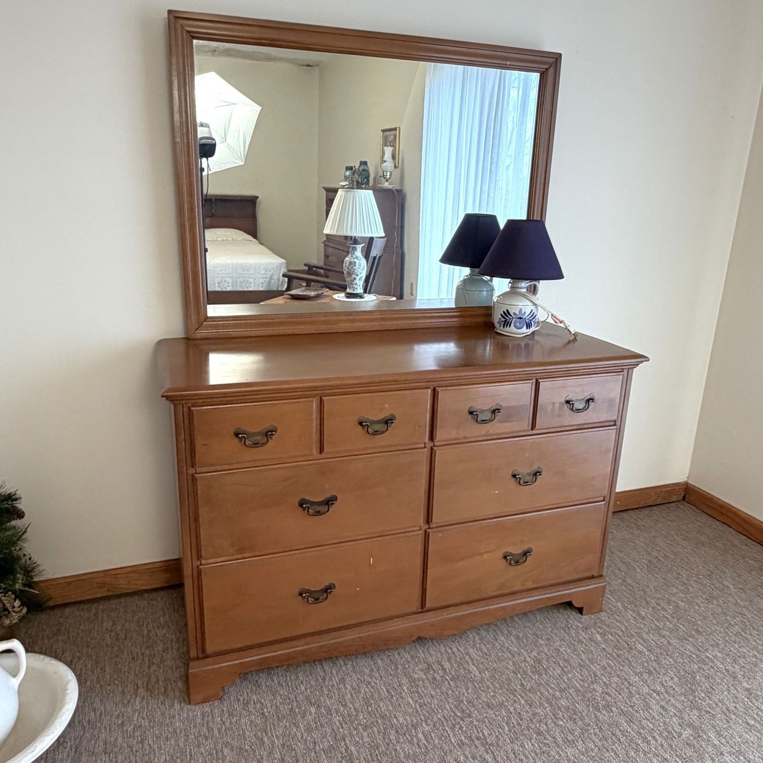 Vintage dresser with attached mirror, overall good cond., shows some water damage near feet, 64"H x 19"D x 48"W (This item is heavy and in the lower level - OK to use a dolly)