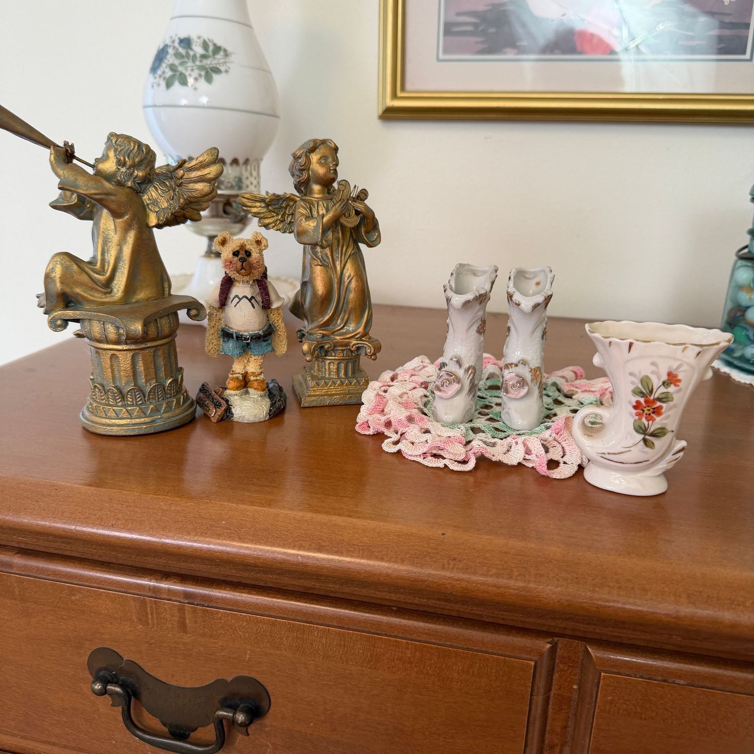 Decorative grouping of angels, bear, porcelain vase and shoes, crocheted doily, 2-5"