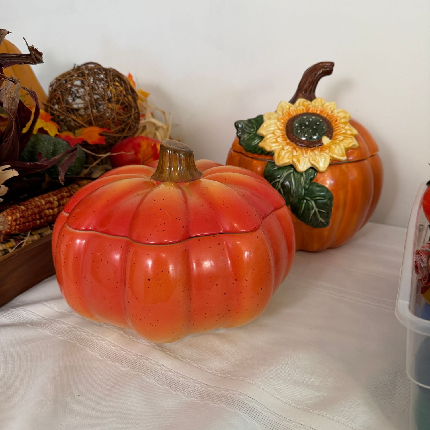 Two ceramic pumpkin cookie jars, canisters, one has a minor chip on the edge of the lid, 8-10"H
