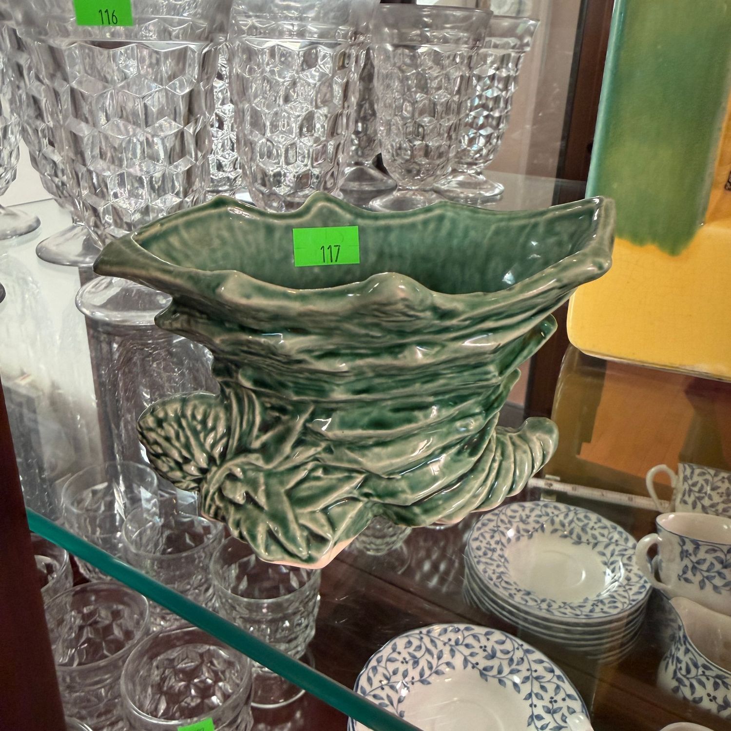 Lot #117, green McCoy pottery cornucopia planter, 3.5 Lot #117, green McCoy pottery cornucopia planter, 3.5"H