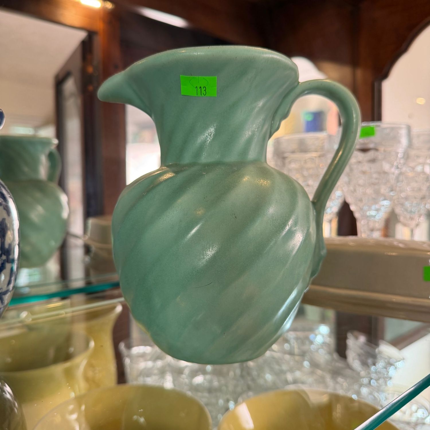 Lot #113, light green swirl pottery pitcher, 7"