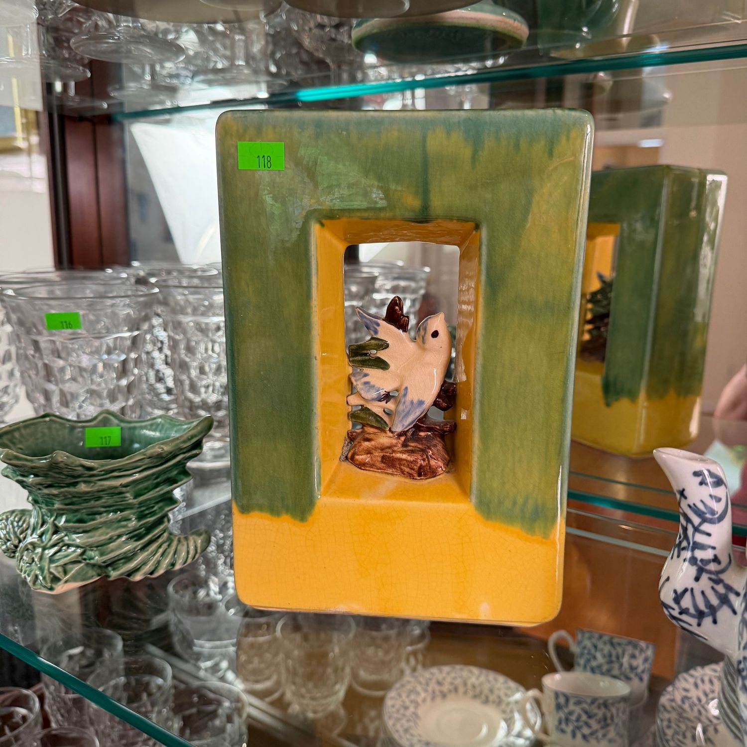 Lot #118, McCoy pottery arcature vase with bird, 9.5"H