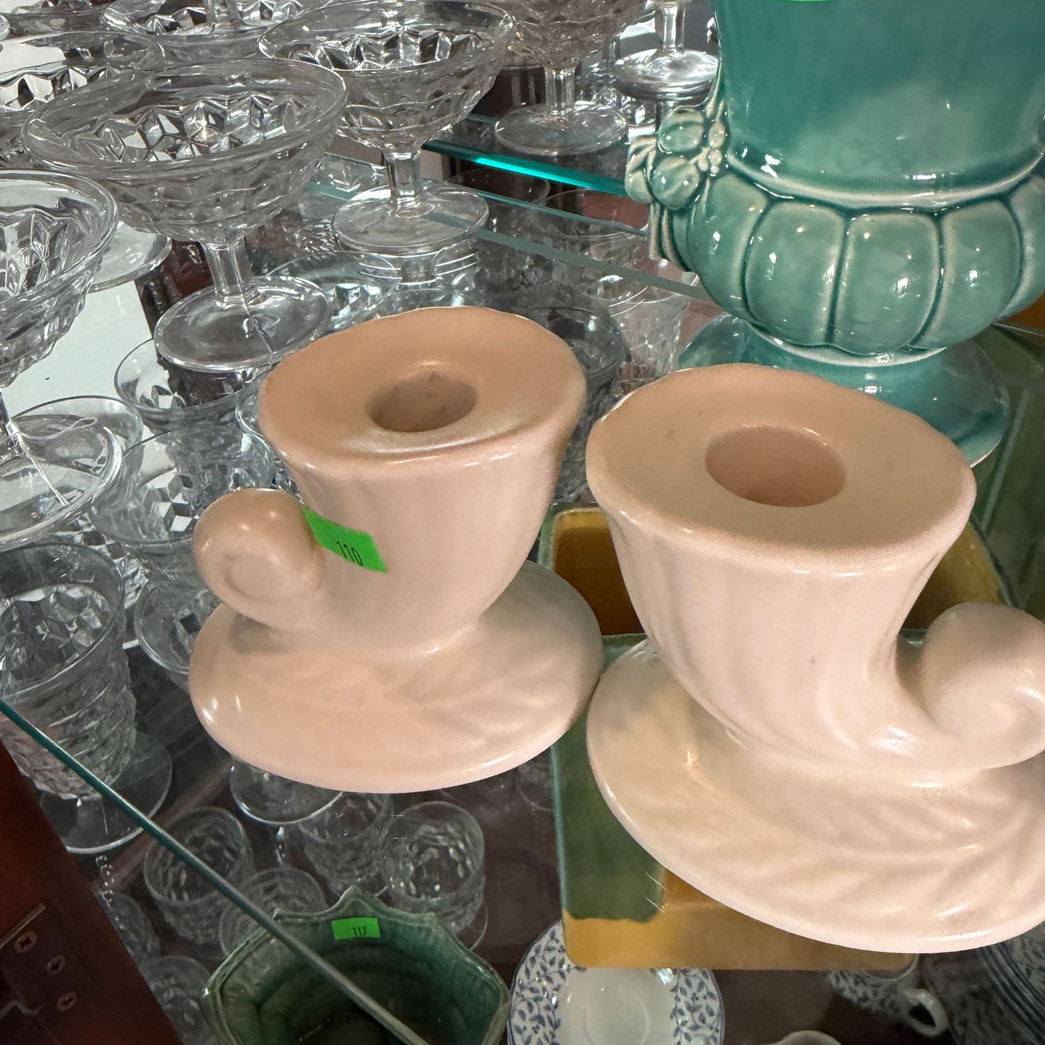 Lot #110 pair of McCoy pottery cornucopia candlesticks Lot #110 pair of McCoy pottery cornucopia candlesticks