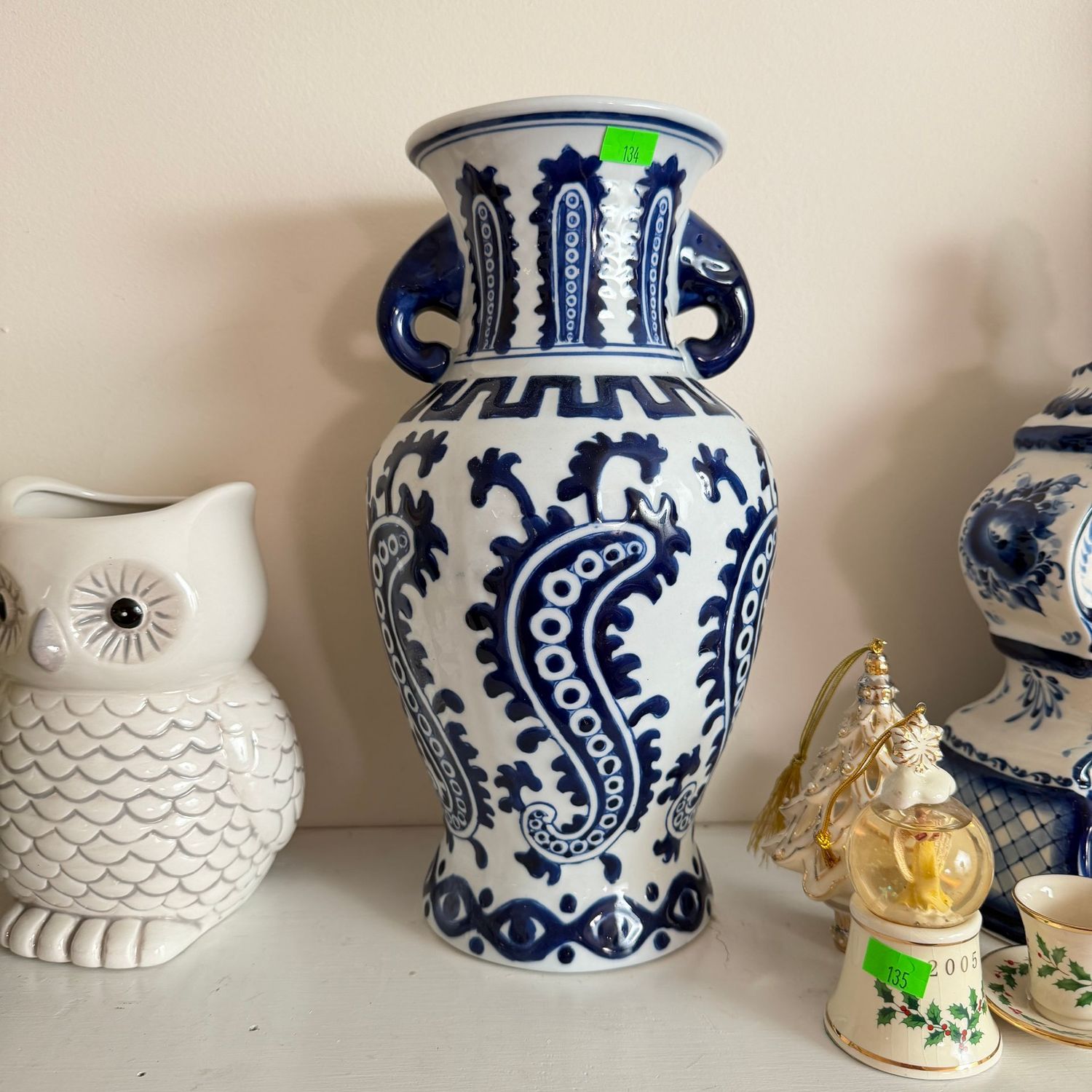 Lot #134, blue and white vase, elephant handles, 12"