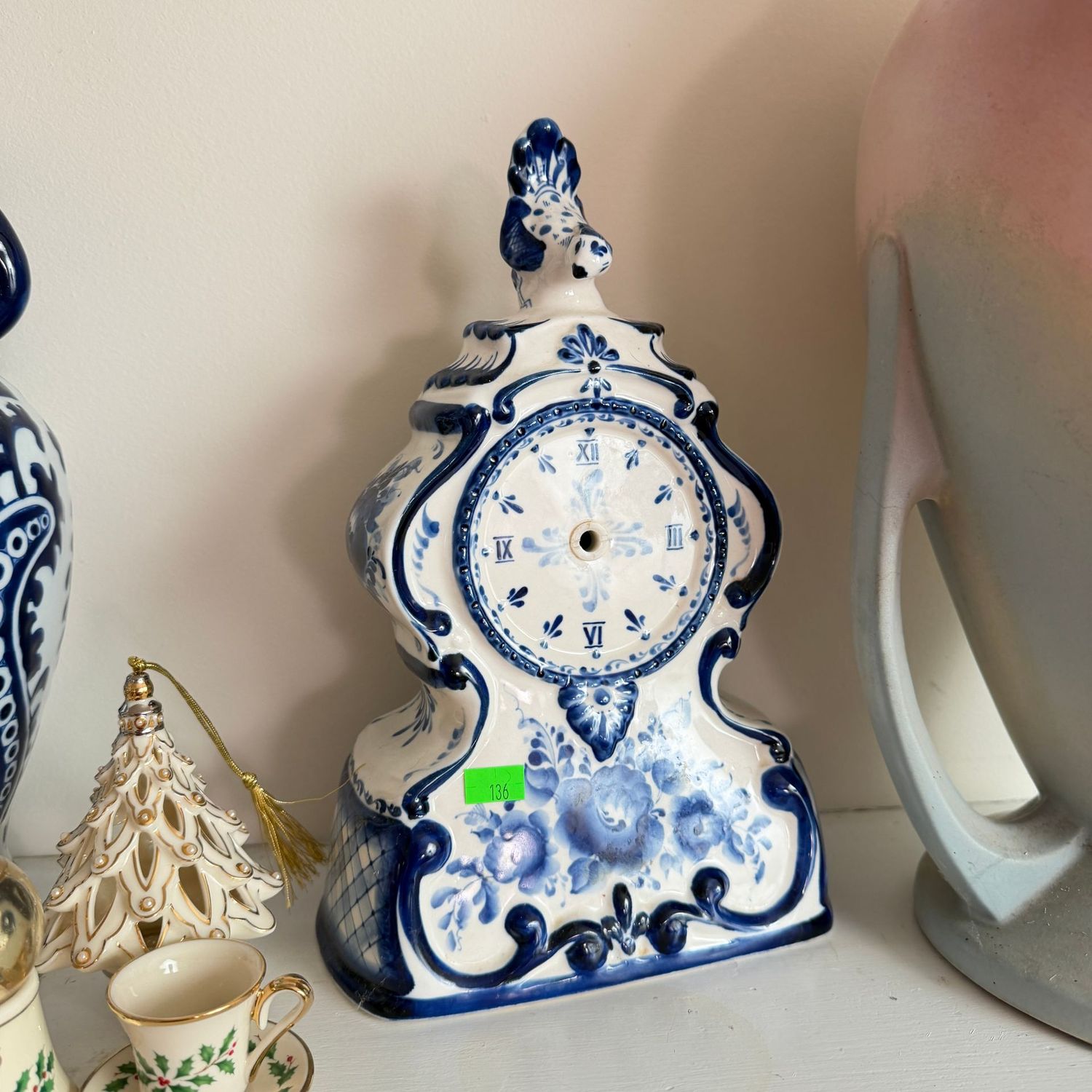 Lot #136 blue and white ceramic mantle clock, needs new battery & clock hands part,  11"