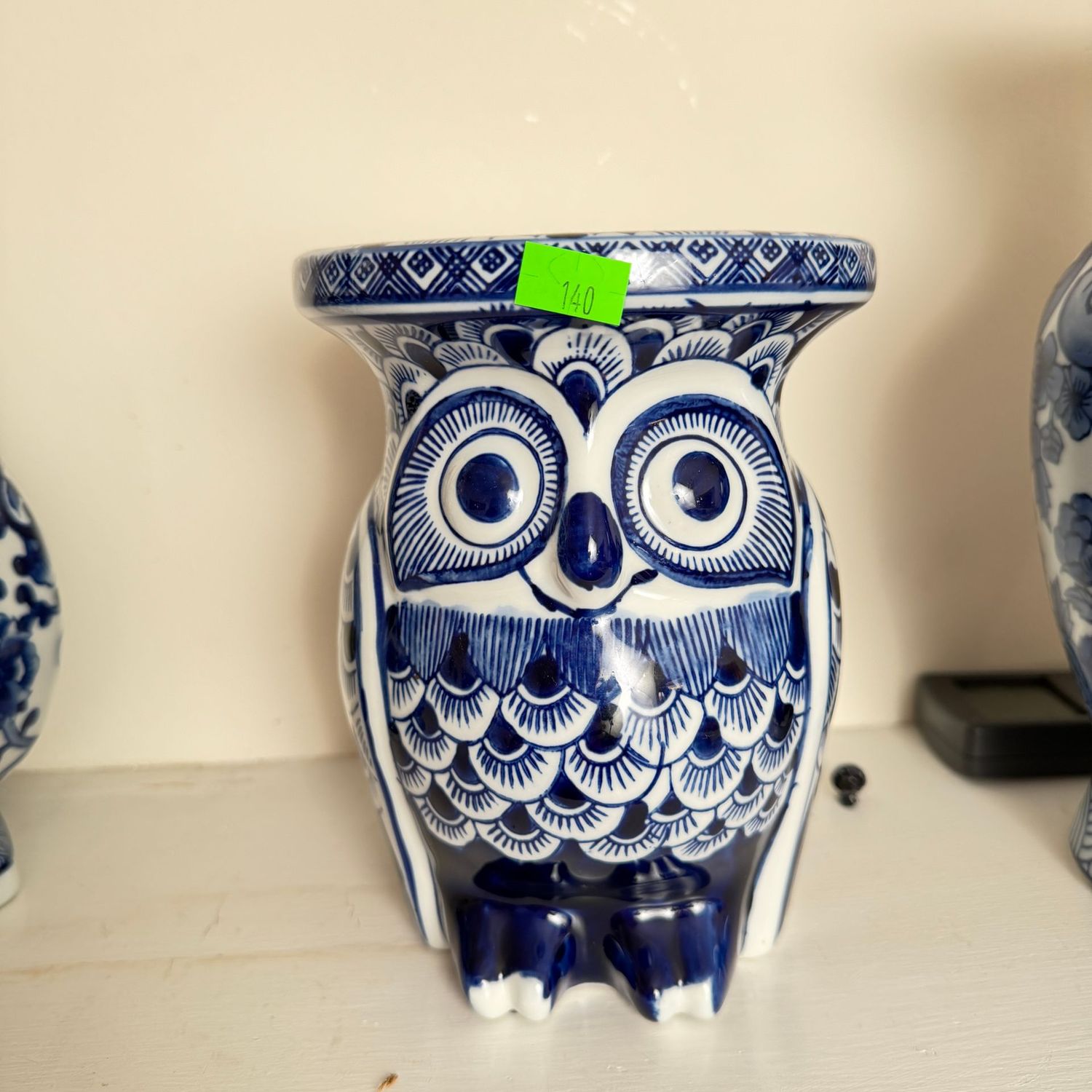 Lot #140, blue and white ceramic owl stand, 7"
