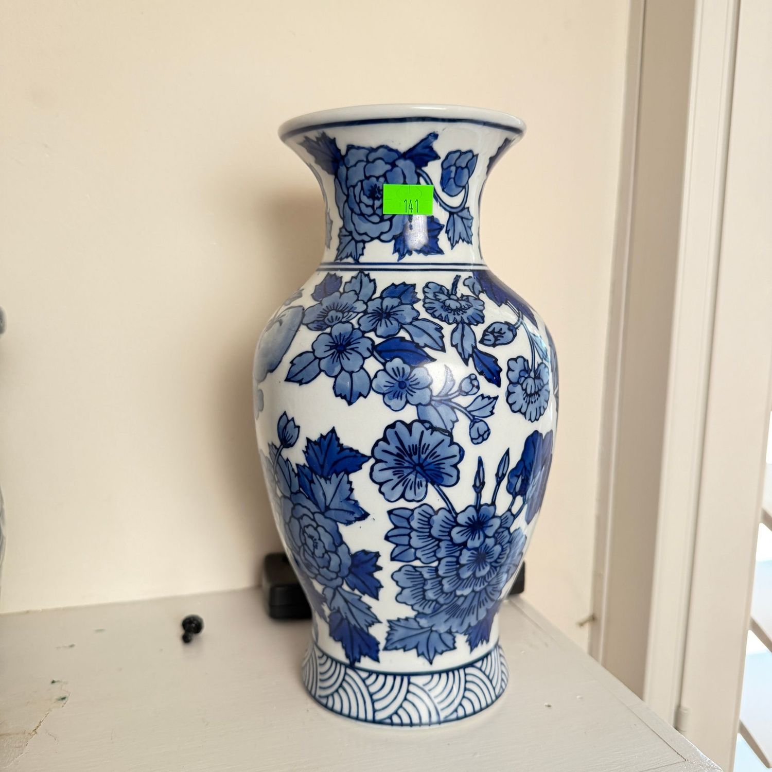 Lot #141, blue and white floral vase, 10"