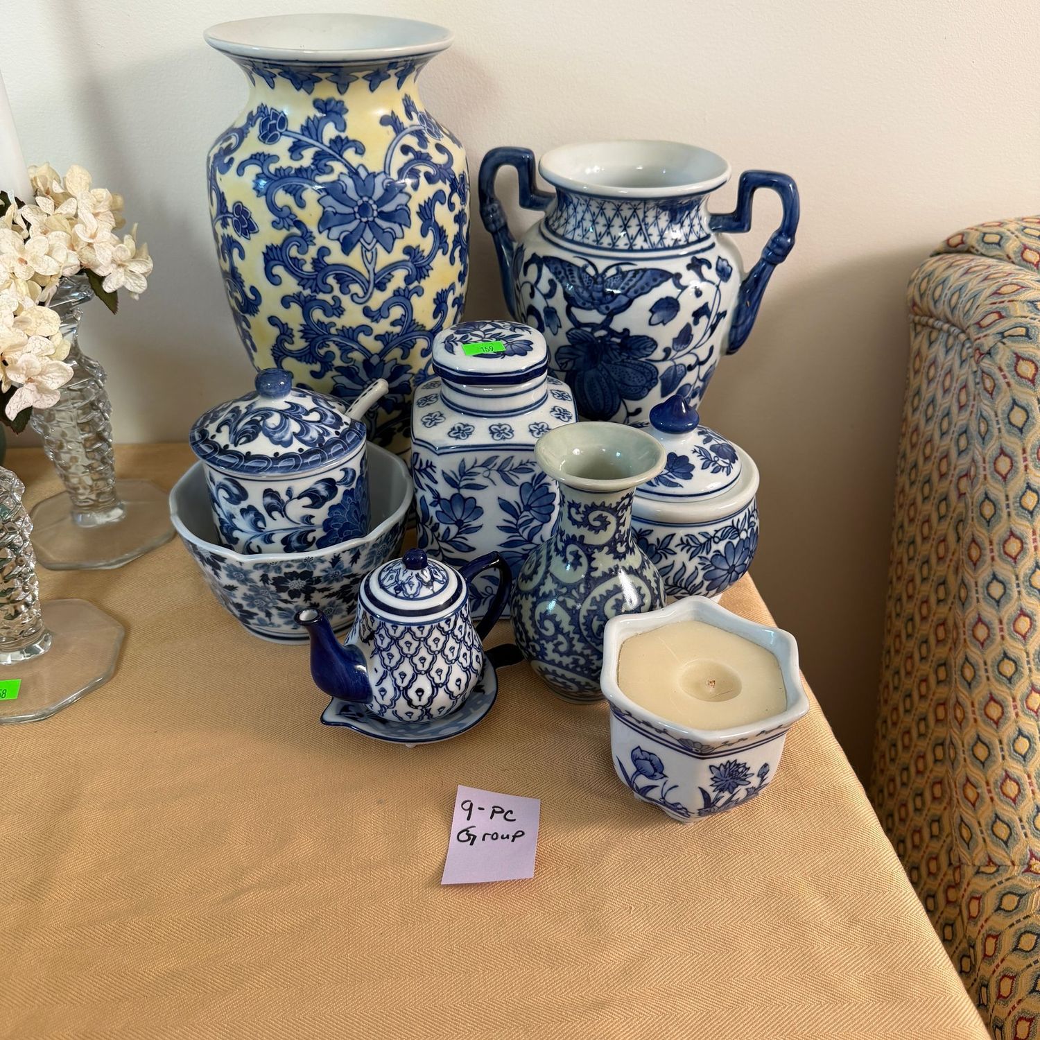 Lot #159, blue and white candle, jars, sugar, and vases, the tallest is 11 Lot #159, blue and white candle, jars, sugar, and vases, the tallest is 11"