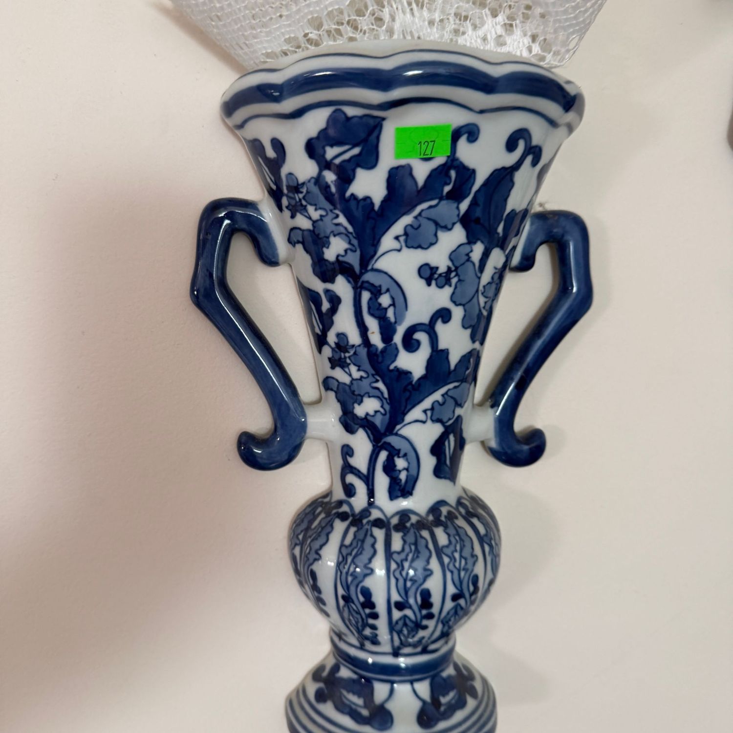 Lot #127, pair of blue and white ceramic urn pocket vases, 9.5"H