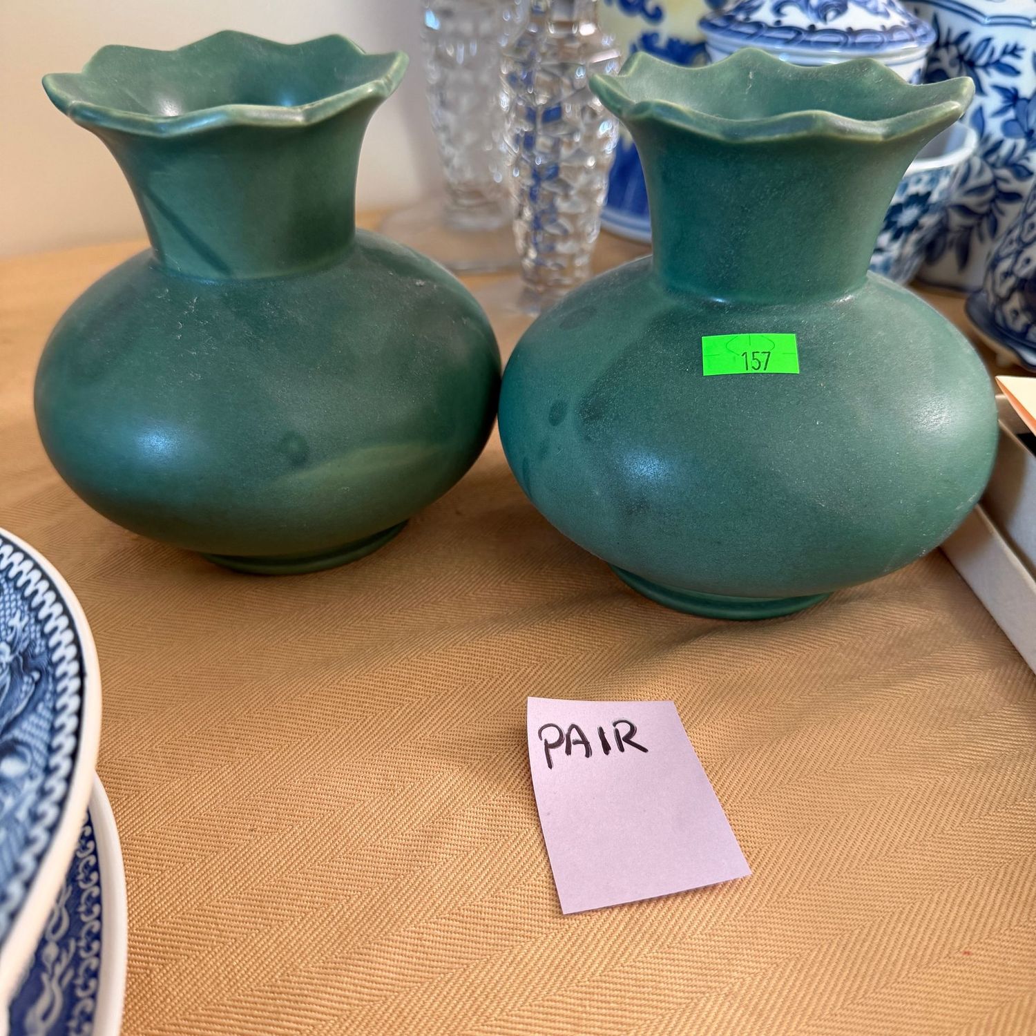 Lot #157, pair of green McCoy pottery vases, 5"H