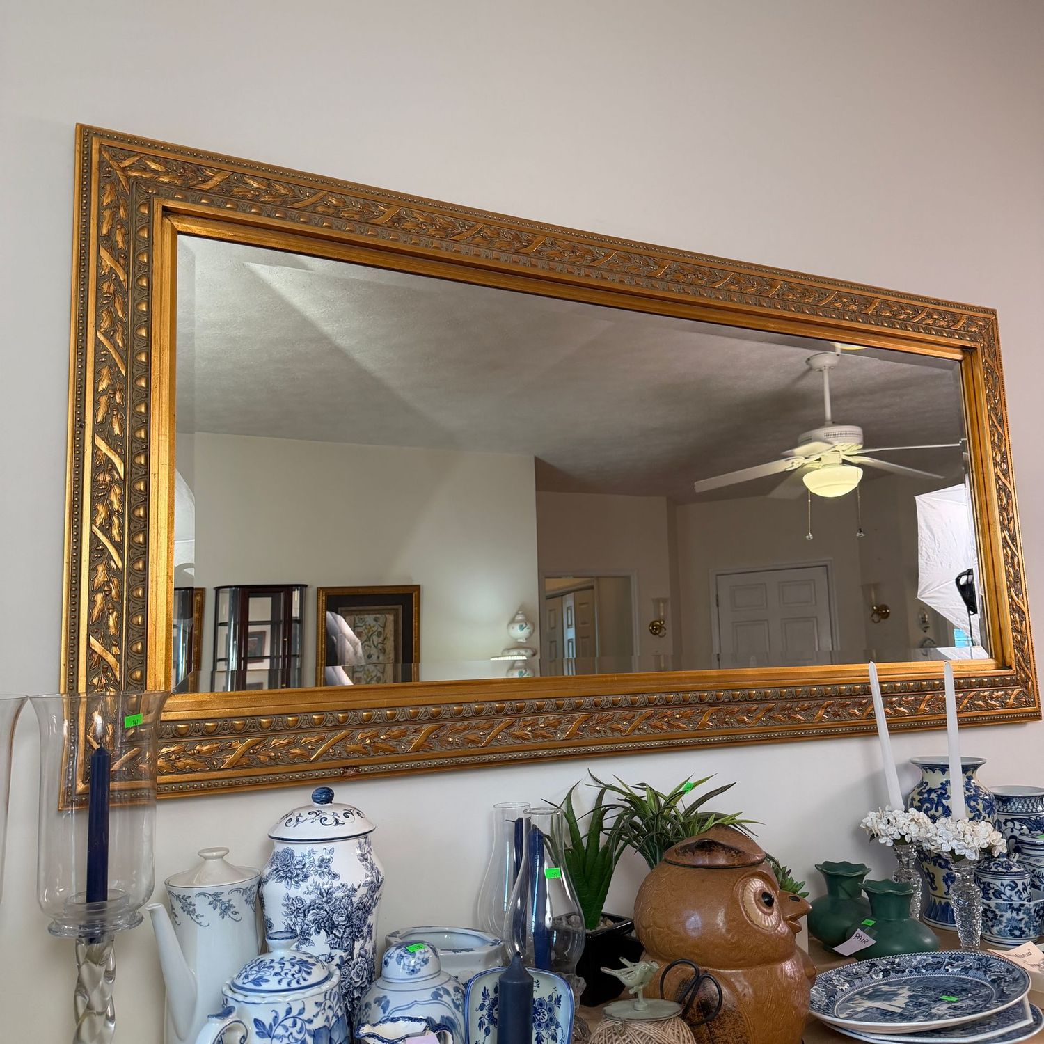 Large beveled mirror with gold wooden frame, leaf and berry design, (Heavy) 33" x 68"