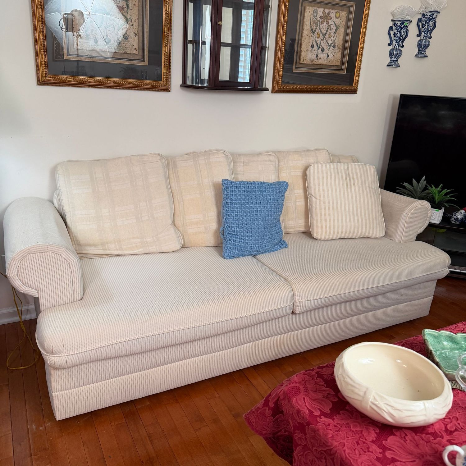 Cream striped Lazarus sofa, comfortable seat, arms have lost some padding, needs vacuumed well, 28 Cream striped Lazarus sofa, comfortable seat, arms have lost some padding, needs vacuumed well, 28"H x 36"D x 7'4"L