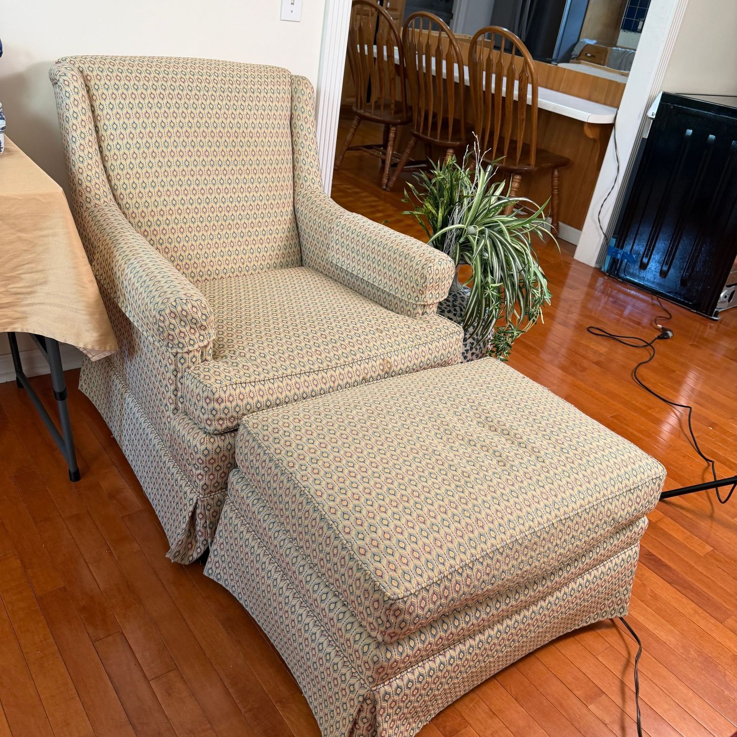 Armchair with matching ottoman, chair has a cleanable spot on seat cushion, 36"H x 34"D x 28"W