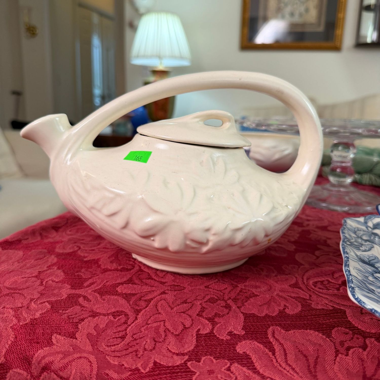Lot #168, McCoy pottery matte white daisy teapot Lot #168, McCoy pottery matte white daisy teapot