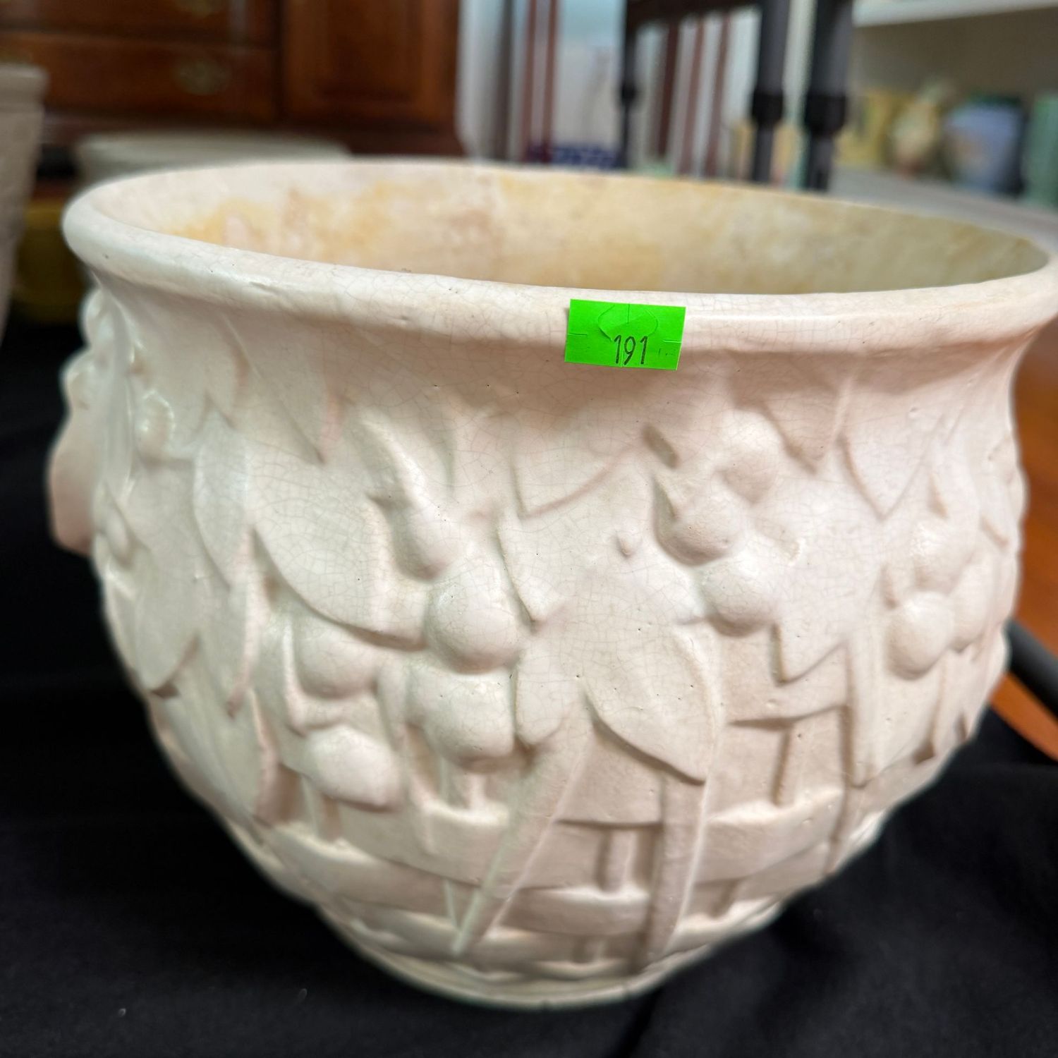 Lot #191, McCoy pottery ivory basketweave and berry ivory jardiniere, 7.5"H x 9"W
